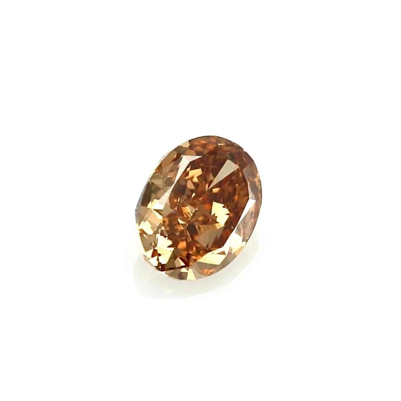 Rare 1.51 Carat Fancy Deep Brown-Orange Diamond – GIA Certified with Red Fluorescence

A captivating and rare gem for the true connoisseur, this exquisite 1.51-carat diamond boasts a Fancy Deep Brown-Orange color, certified by the Gemological