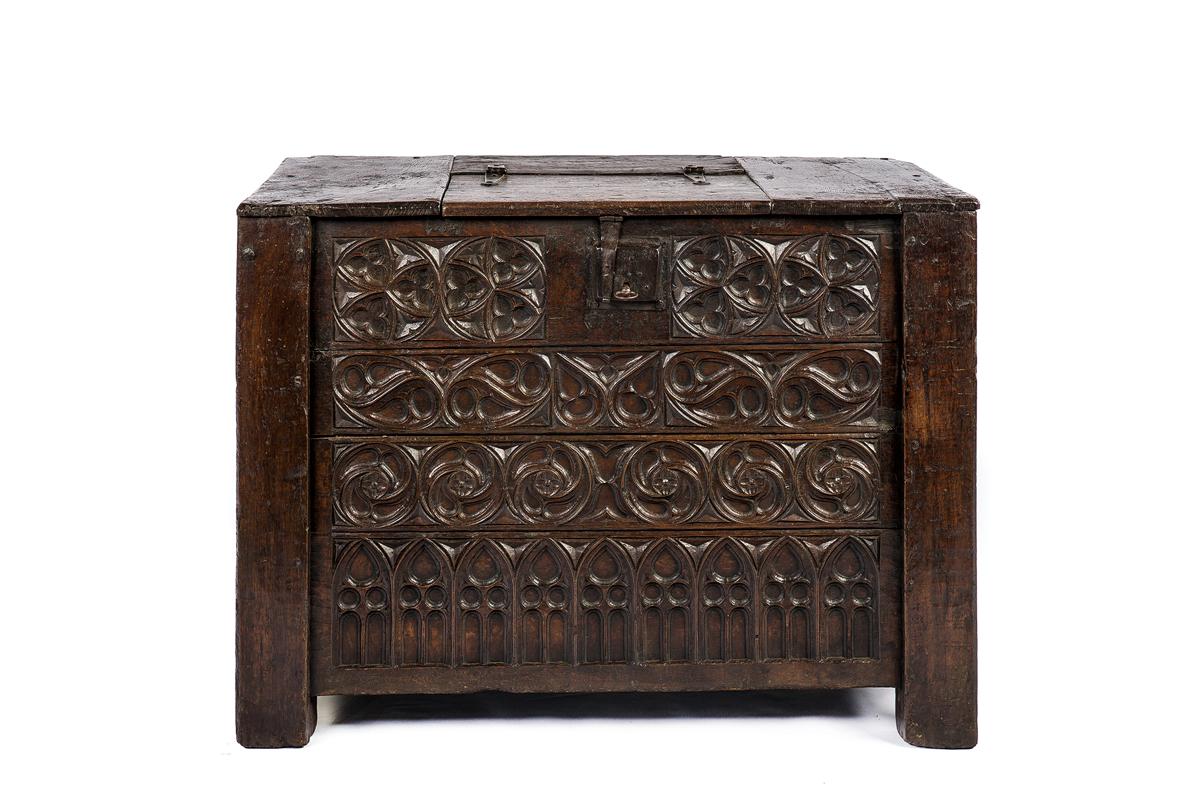 A very rare chest that was completely made of solid oak from the Netherlands middle ages. 
It is a joined chest with hand carved geometric gothic front panels. The ornaments used are typical Gothic ornaments such as trefoil, mouchette, and trace.
