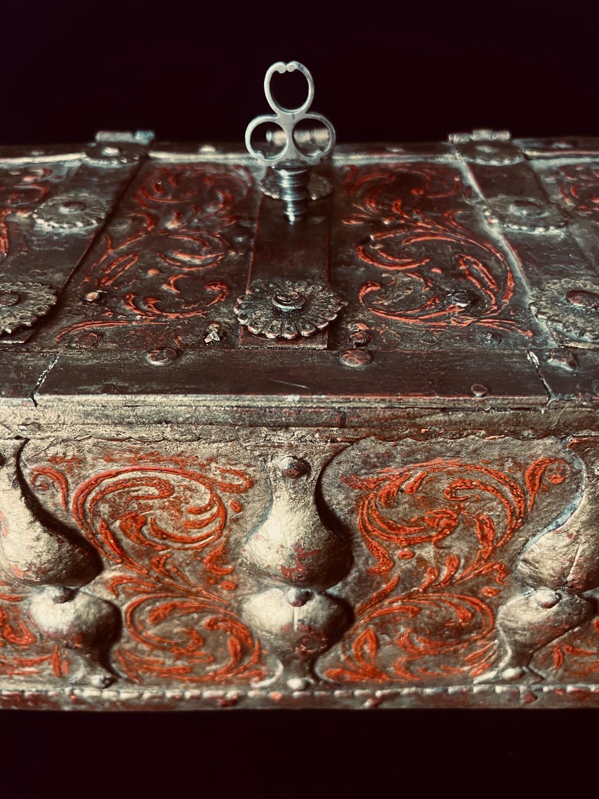An extraordinarily rare and visually striking 16th-century Venetian iron treasure coffer, showcasing the height of Renaissance artistry and engineering. Crafted in the early to mid-1500s, this richly ornamented strongbox reflects the opulence and