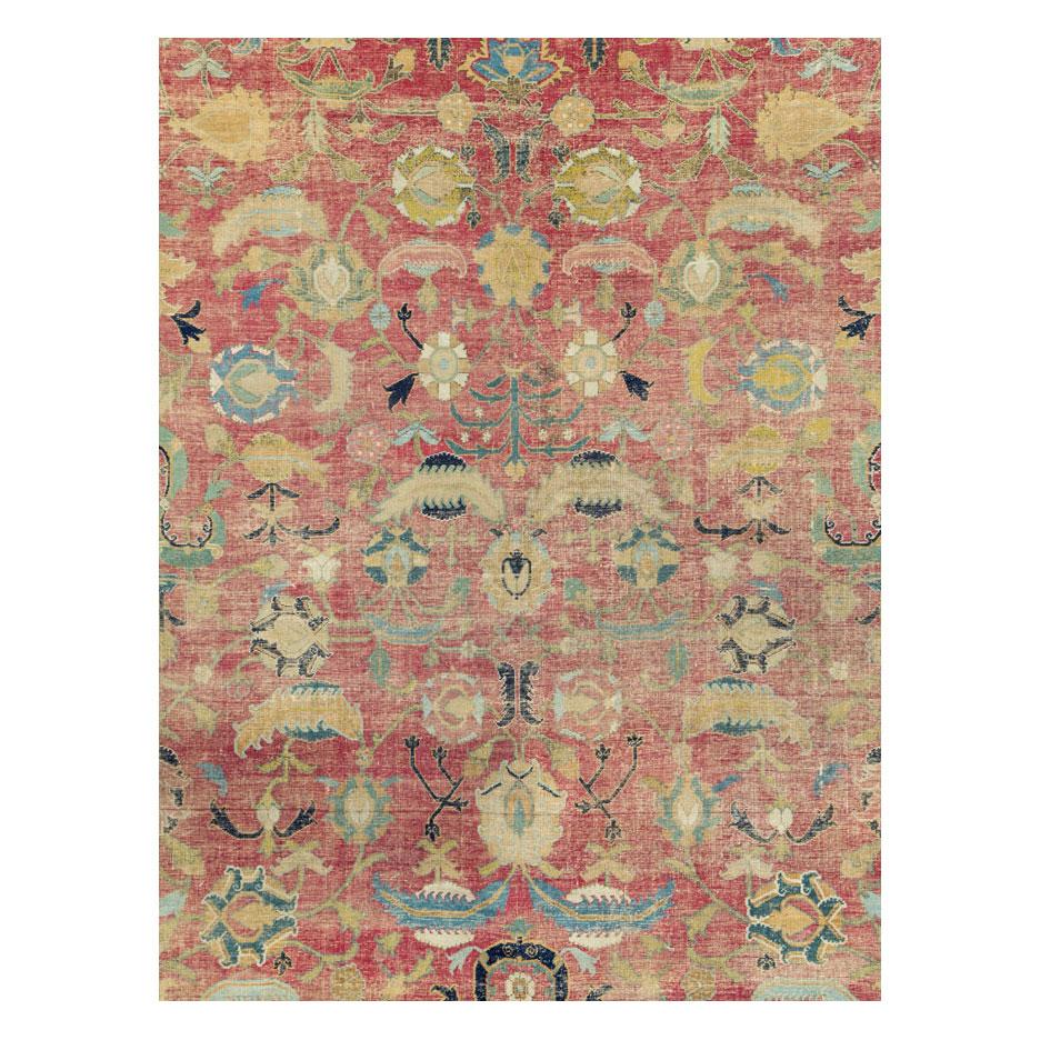 An antique Mughal period Persian Indo-Isfahan large room size carpet handmade during the 17th century.

Measures: 14' 1