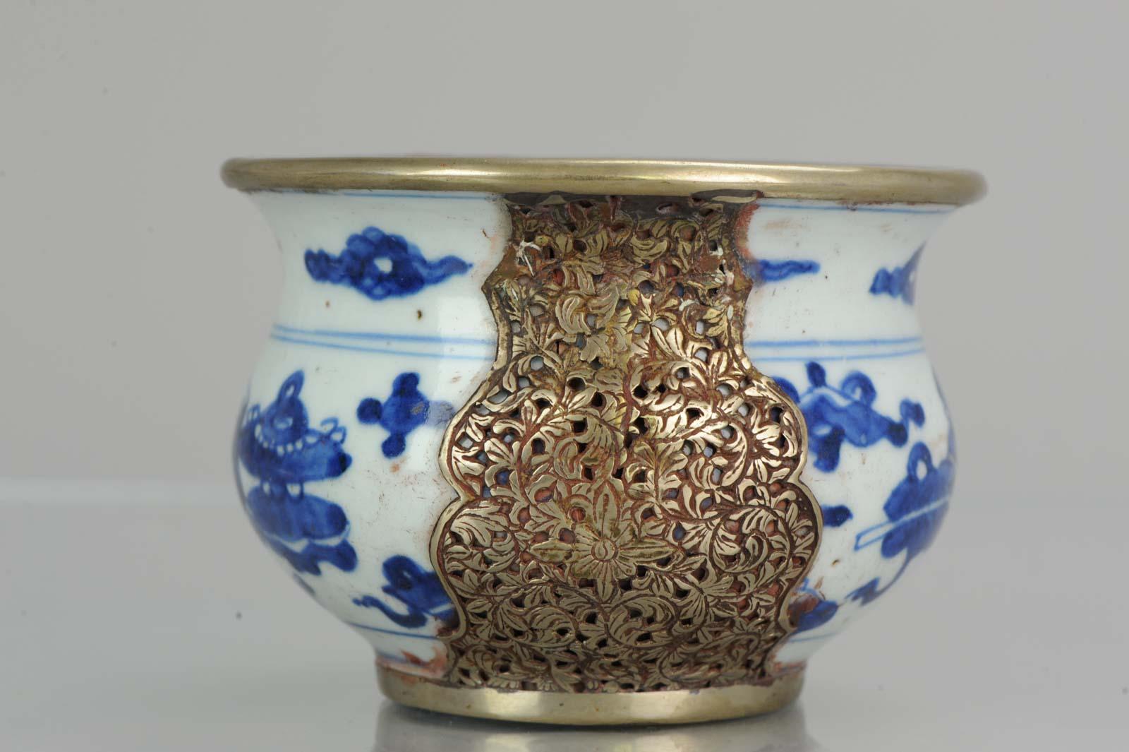 A very nice bowl. Transitional or early Kangxi period.

Nice and beautiful addition all-over the bowl and a nice symbol in the interior. The bowl came from a lot of Bleu de Hue porcelain so more than probably the additions were done in South East