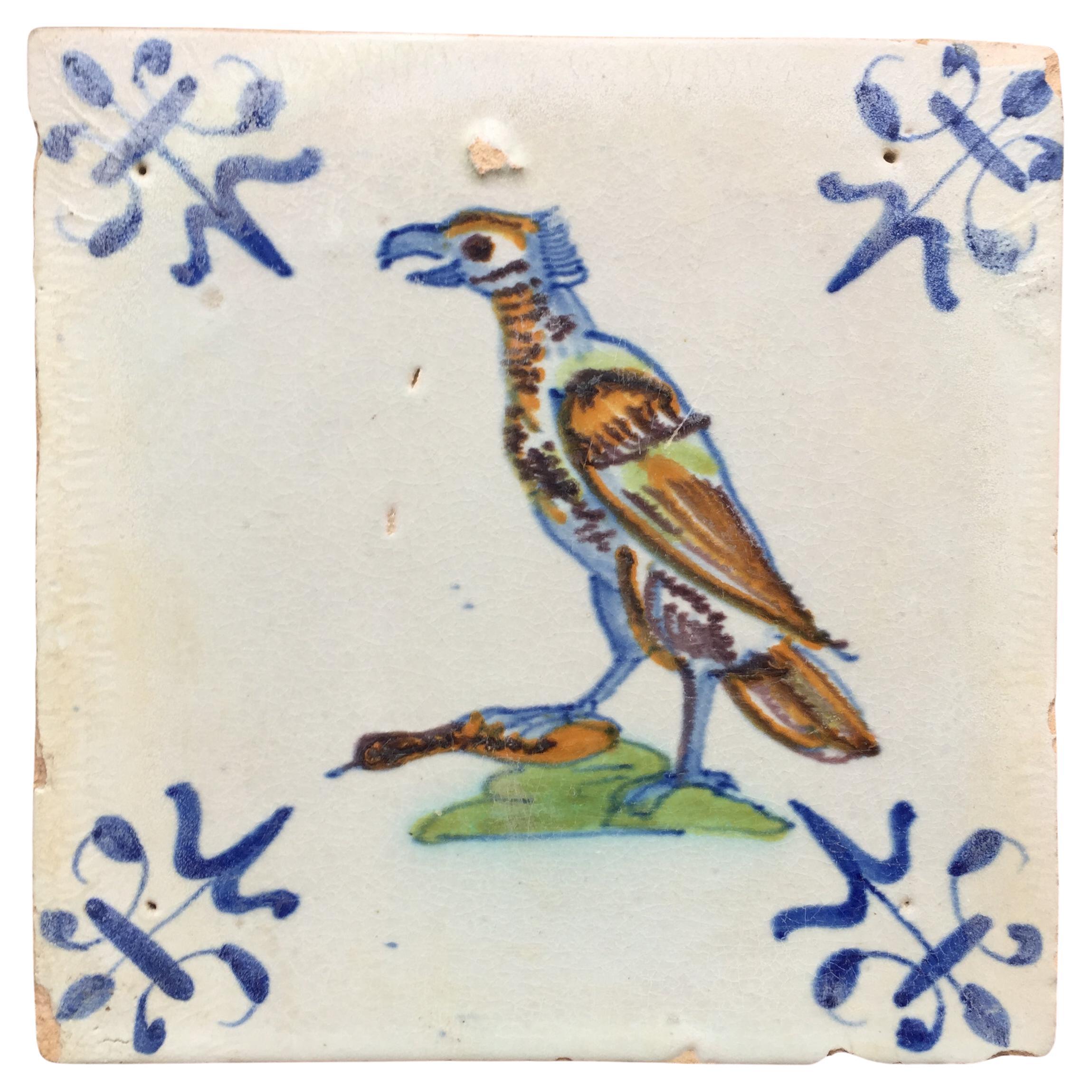 Rare 17th Century Dutch Delft Tile with Decoration of a Predator Bird with Prey For Sale