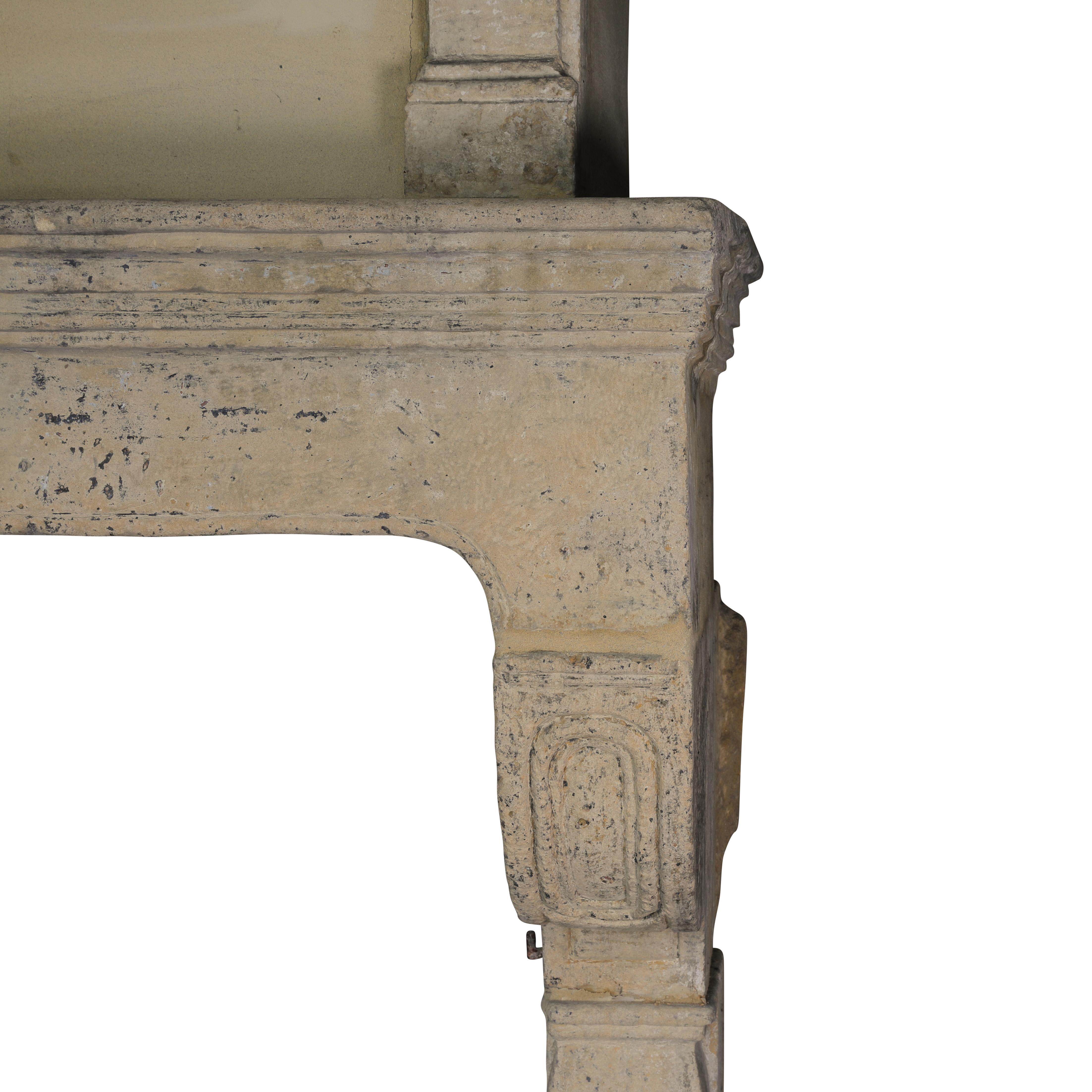 Rare 17th Century French Country Style Limestone Fireplace Mantle with Trumeau For Sale 9