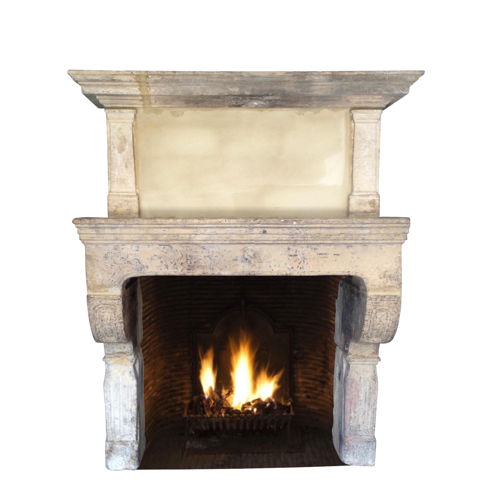 Rare 17th Century French Country Style Limestone Fireplace Mantle with Trumeau In Excellent Condition For Sale In Beervelde, BE