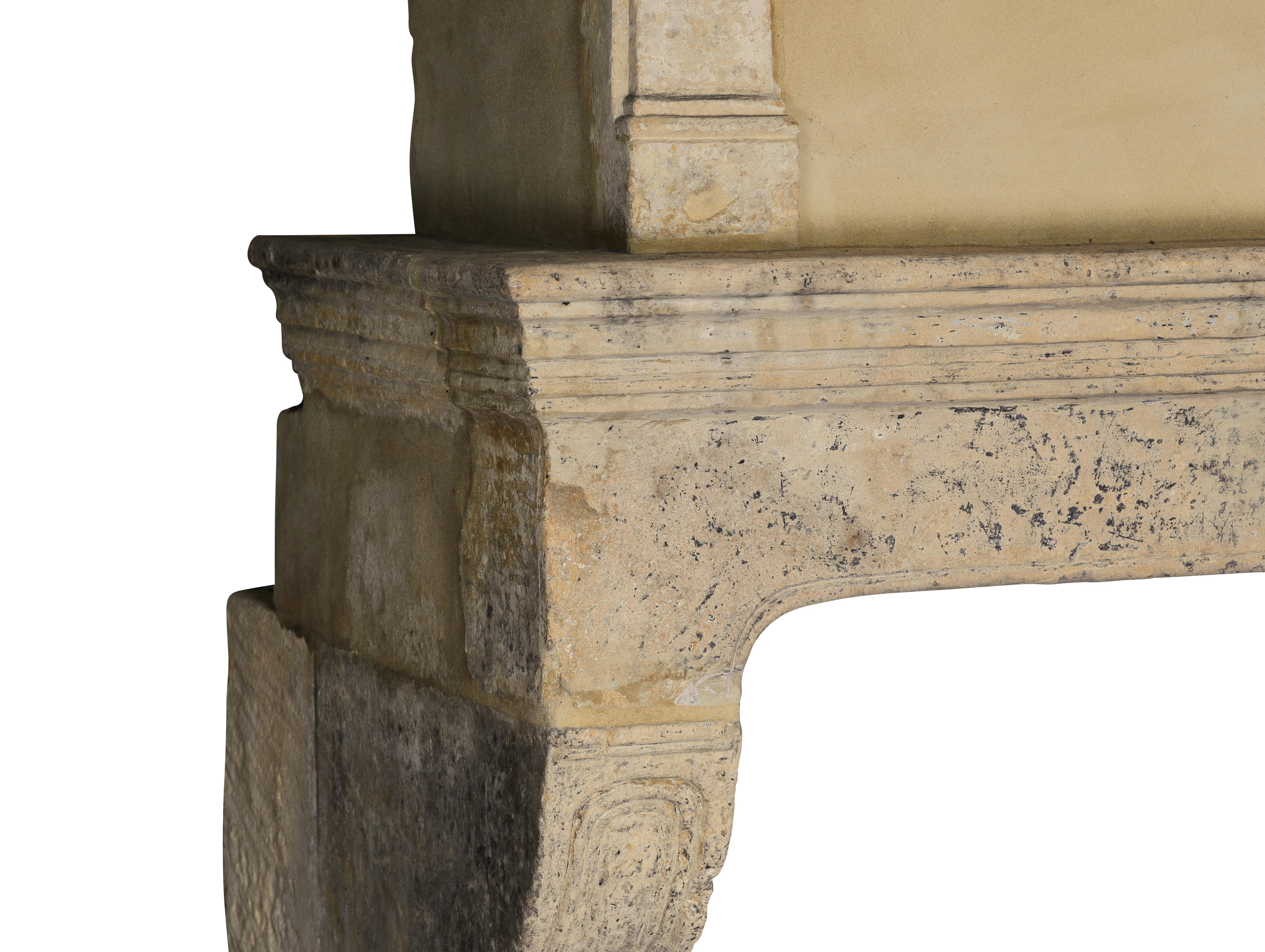 Rare 17th Century French Country Style Limestone Fireplace Mantle with Trumeau In Excellent Condition For Sale In Beervelde, BE