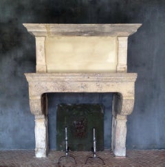 Rare 17th Century French Country Style Limestone Fireplace Mantle with Trumeau