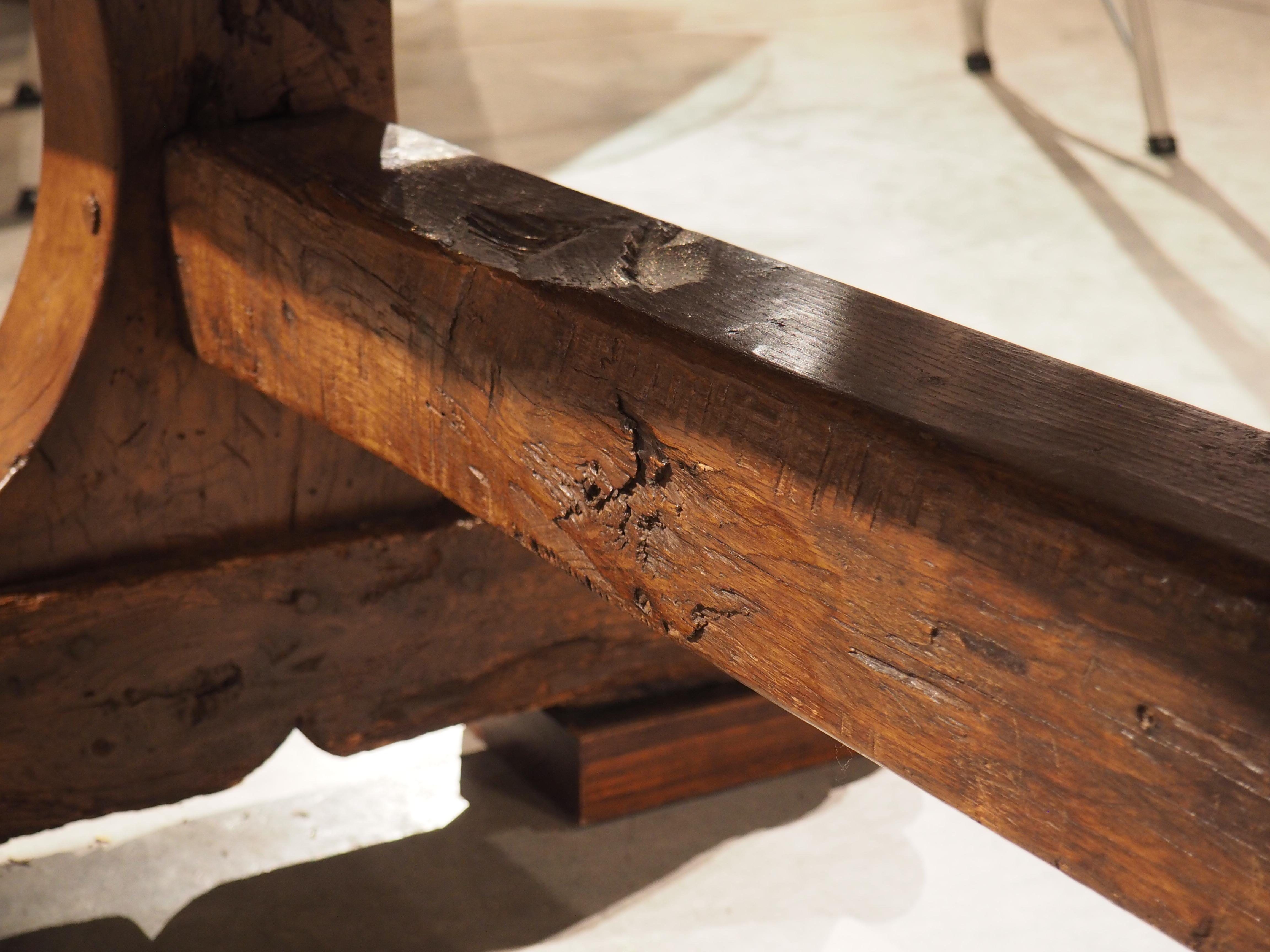 Truly a one-of-a-kind piece of furniture, this oak refectory table was hand-carved in France during the 1600’s. The 3 5/8” thick top has subtle undulations along the edges as a result of the carving process. French wax has been applied to the table,