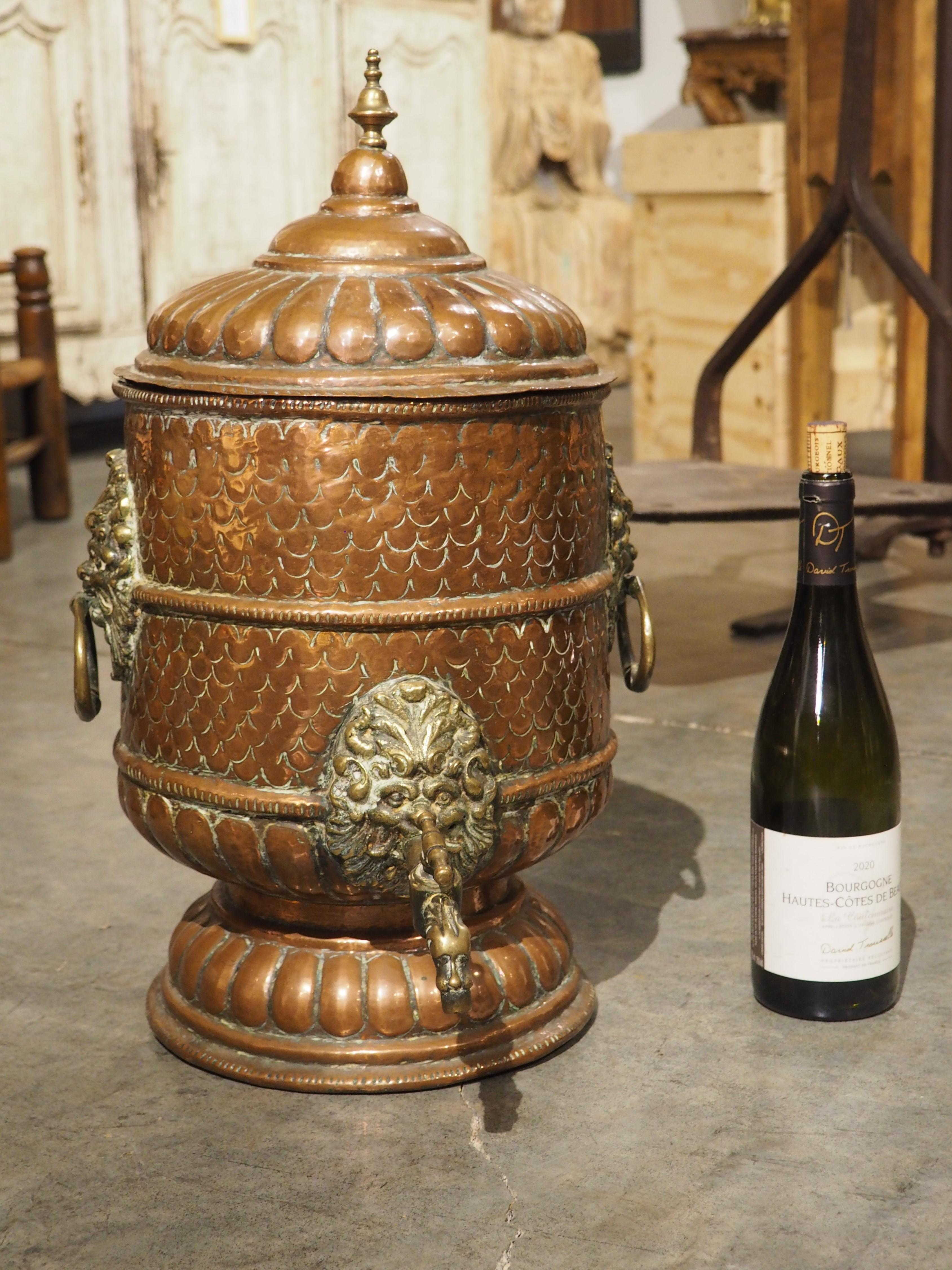 Based on the exquisite detailing and brass embellishments, this rare copper water fountain would have most likely belonged to a wealthy French family in the 1600s. While not a fountain in the traditional sense, it would have been used to dispense