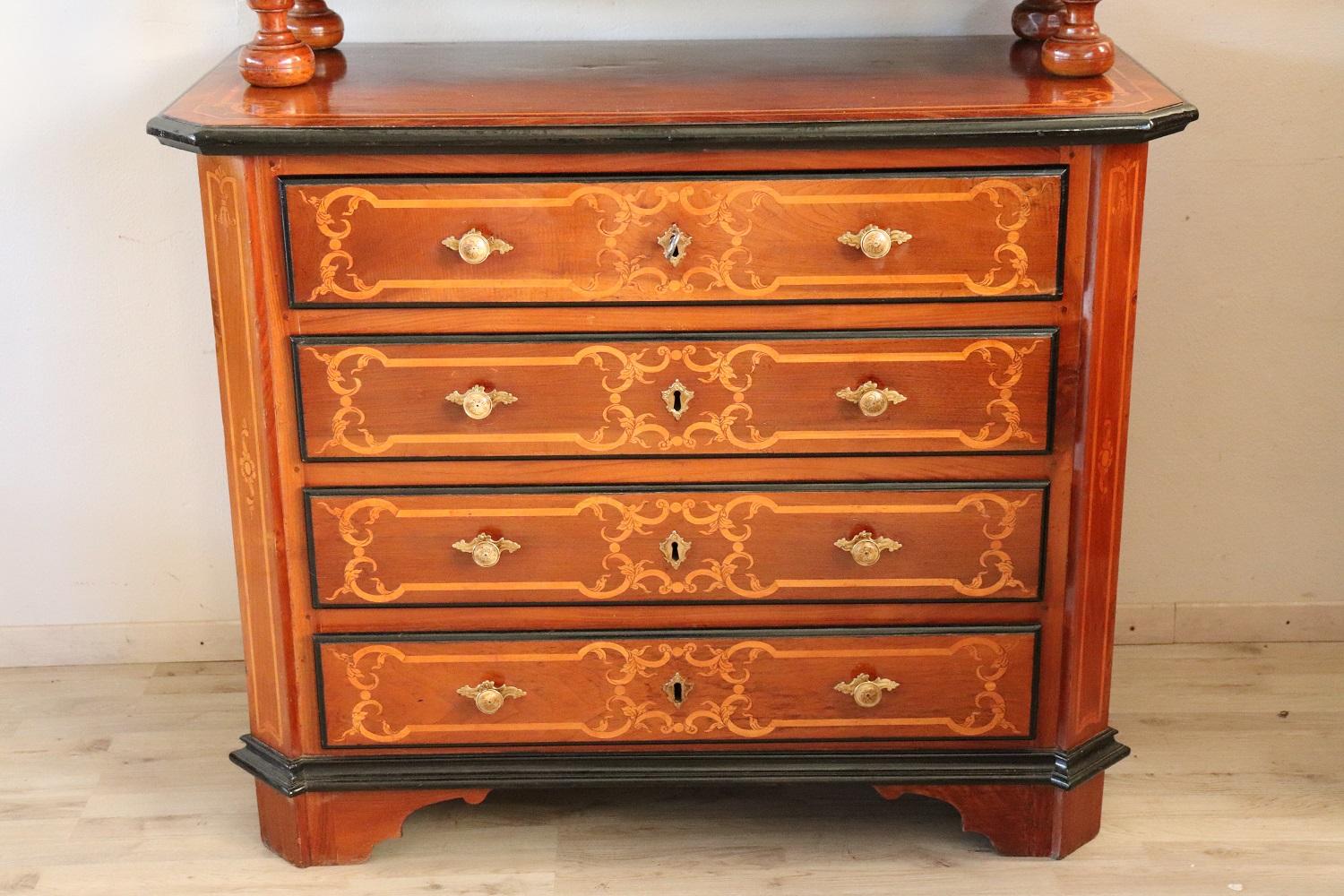 Important antique Italian Louis XIV period cabinet 1680s in walnut wood. Rafined Inlaid decoration on each side. On the front in the upper part six small drawers and a small central compartment. In the lower part equipped with four large drawers.