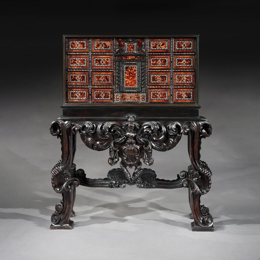Rare 17th Century Neapolitan Ebony Tortoiseshell and Mother of Pearl Cabinet

From the Perego Collection in Monza, an important 17th Century Italian architectural ebony and tortoiseshell cabinet inlayed with mother of pearl and pewter on a Baroque