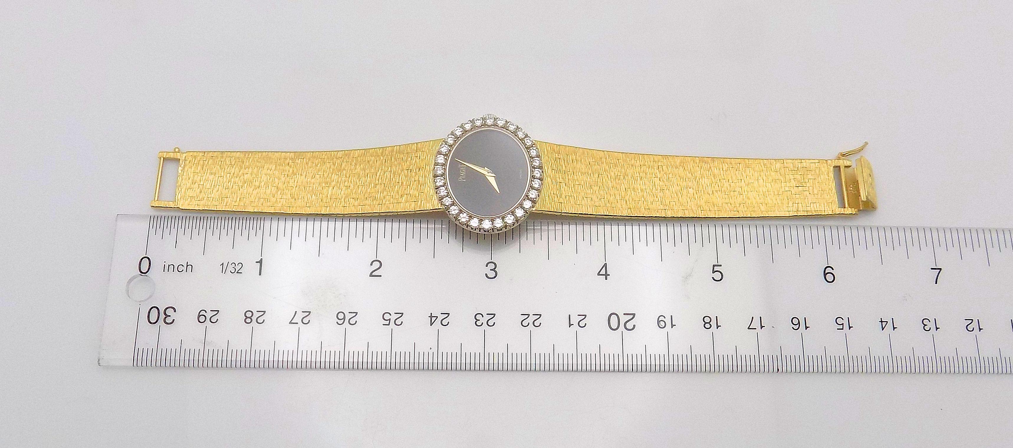 Round Cut Rare 18 Karat Yellow Gold Lady's Stone Dial and Diamond Bezel Piaget Wrist Watch For Sale