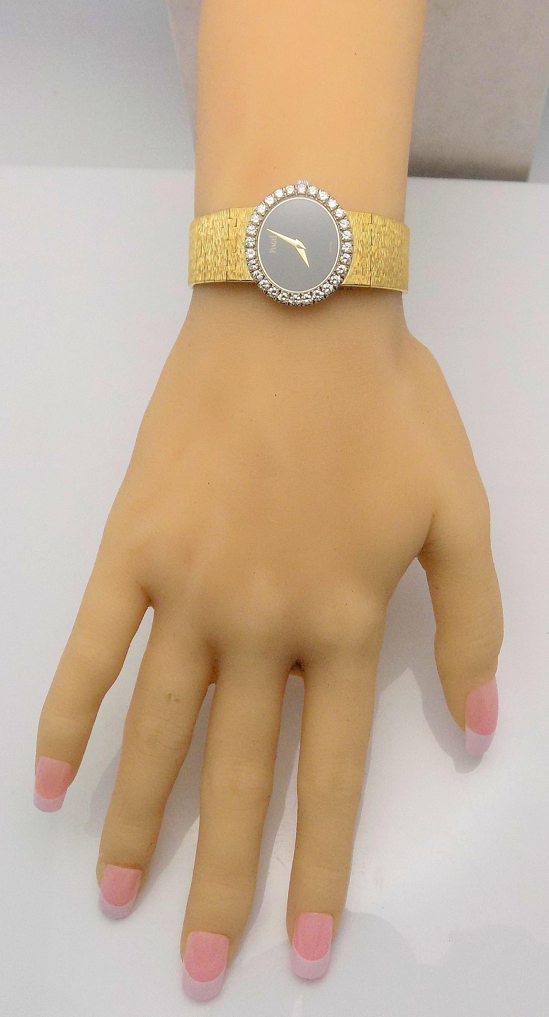 Rare 18 Karat Yellow Gold Lady's Stone Dial and Diamond Bezel Piaget Wrist Watch For Sale 1