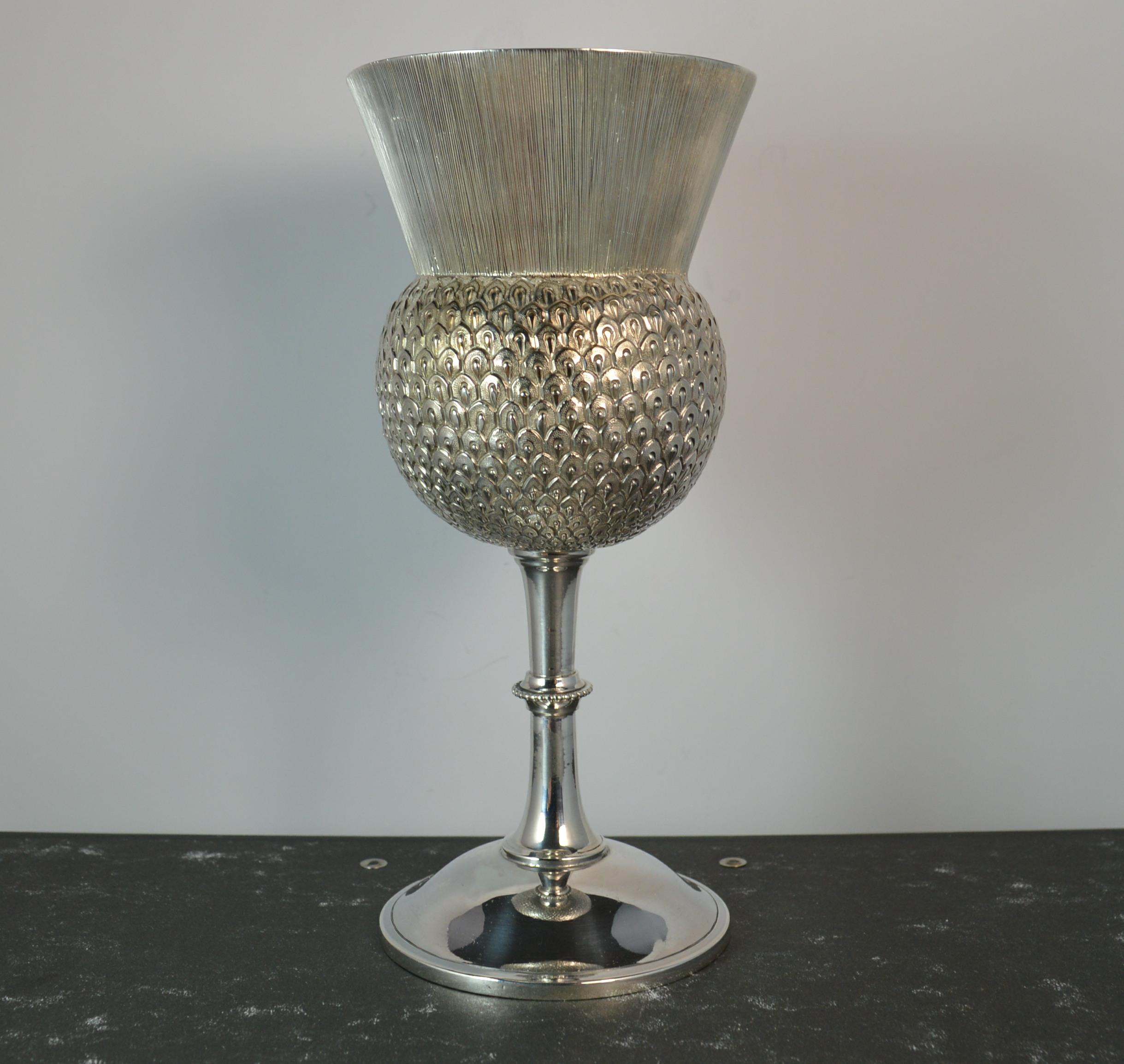 A fine novelty piece of mid Victorian silver.
English made in the form of a thistle. 
Ideal drinking vessel or goblet.

Hallmarks ; lion, Birmingham assay, date letter x and makers initials
Weight ; 170 grams
Size ; 17.4cm tall, 72mm diameter