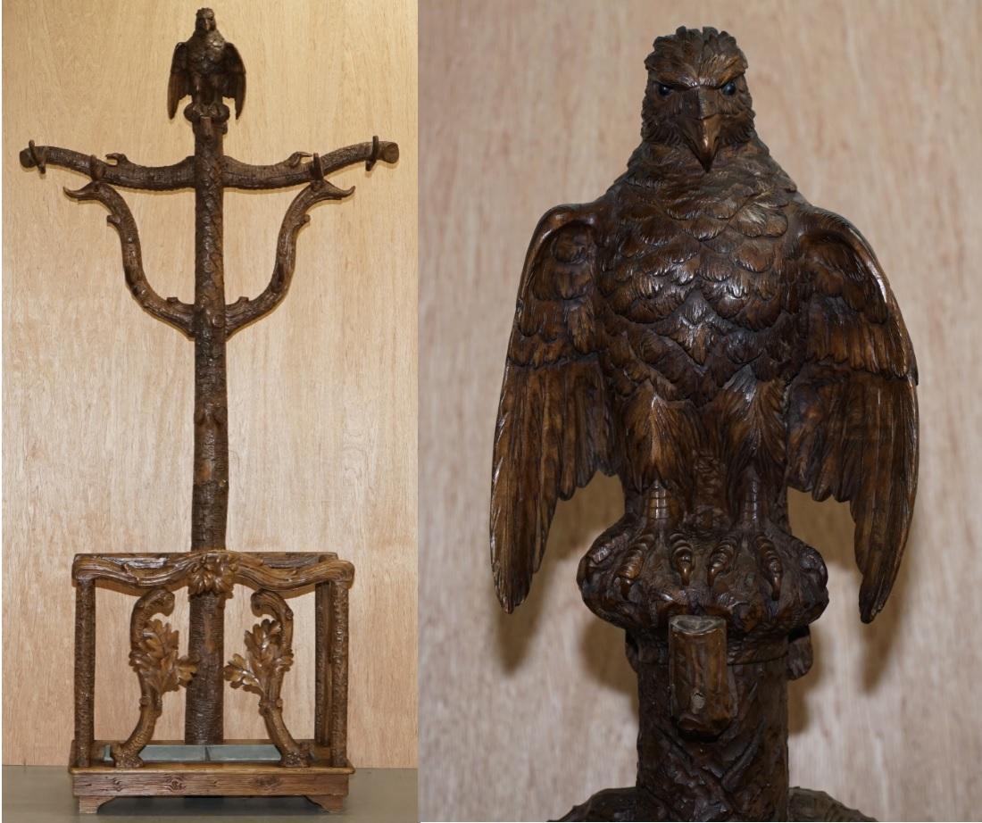 We are delighted to this very rare original Black Forest wood hand carved coat hat and umbrella rack finished with large American eagle

A very rare and collectable piece, I’ve only ever seen these with the bears on before, this must have been a
