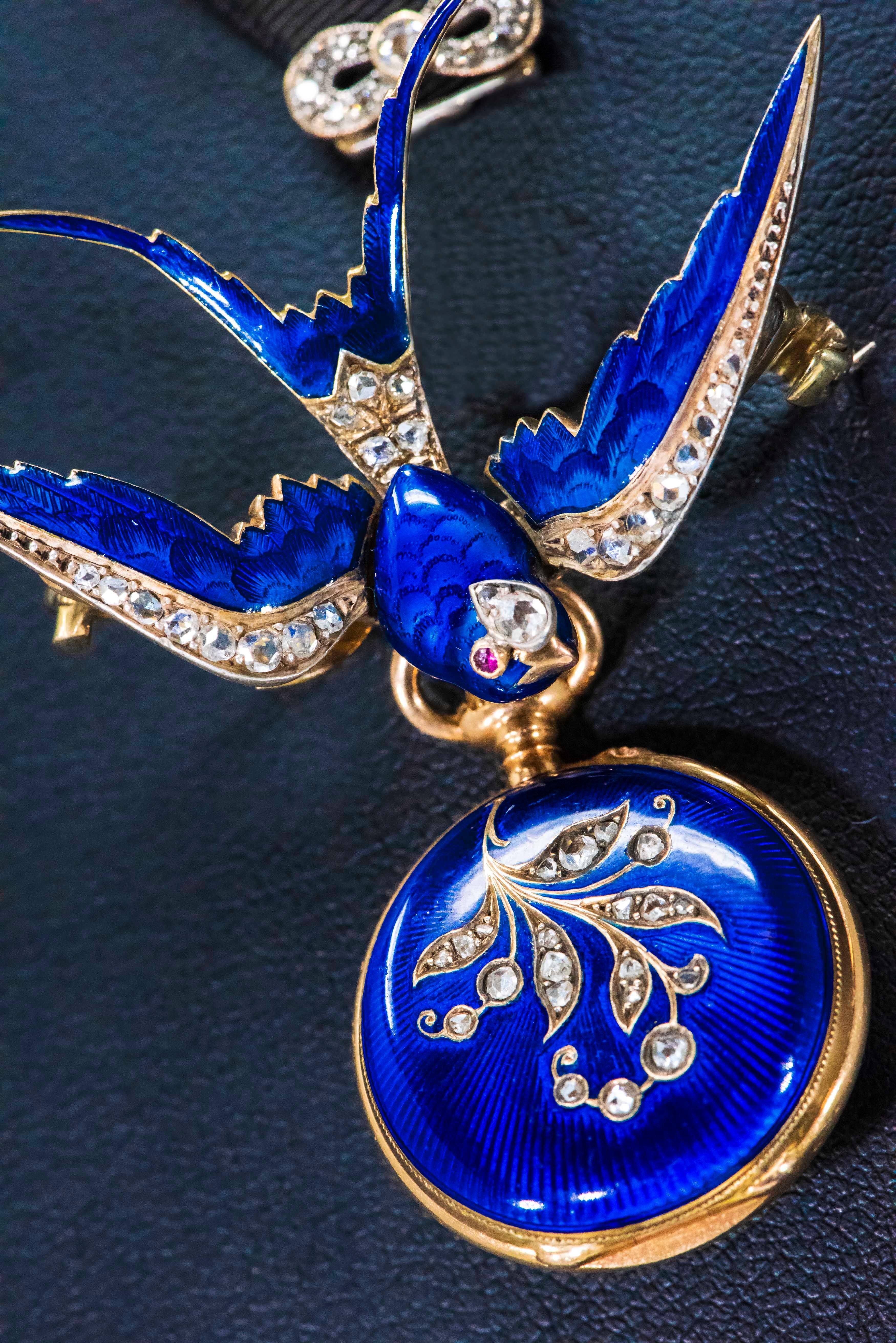 Golay-Leresche et Fils, Genève 
Dimensions
Top of Swallow Tail to bottom of lapel pocket watch pendant : 50mm
Width of Pendant at widest part : 40mm 

The present example is a true work of art and is an extremely rare creation by one of the most