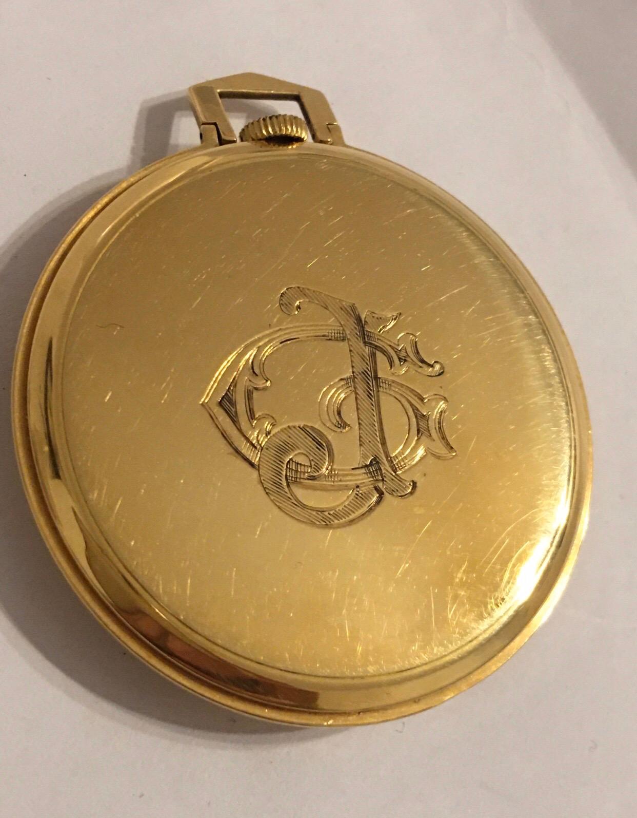 This beautiful rare and very fine quality 45mm diameter gold pocket watch is in good working condition and it is running well. It comes with an old box. This watch weighed 43.3 grams.

Please study the images carefully as form part of the