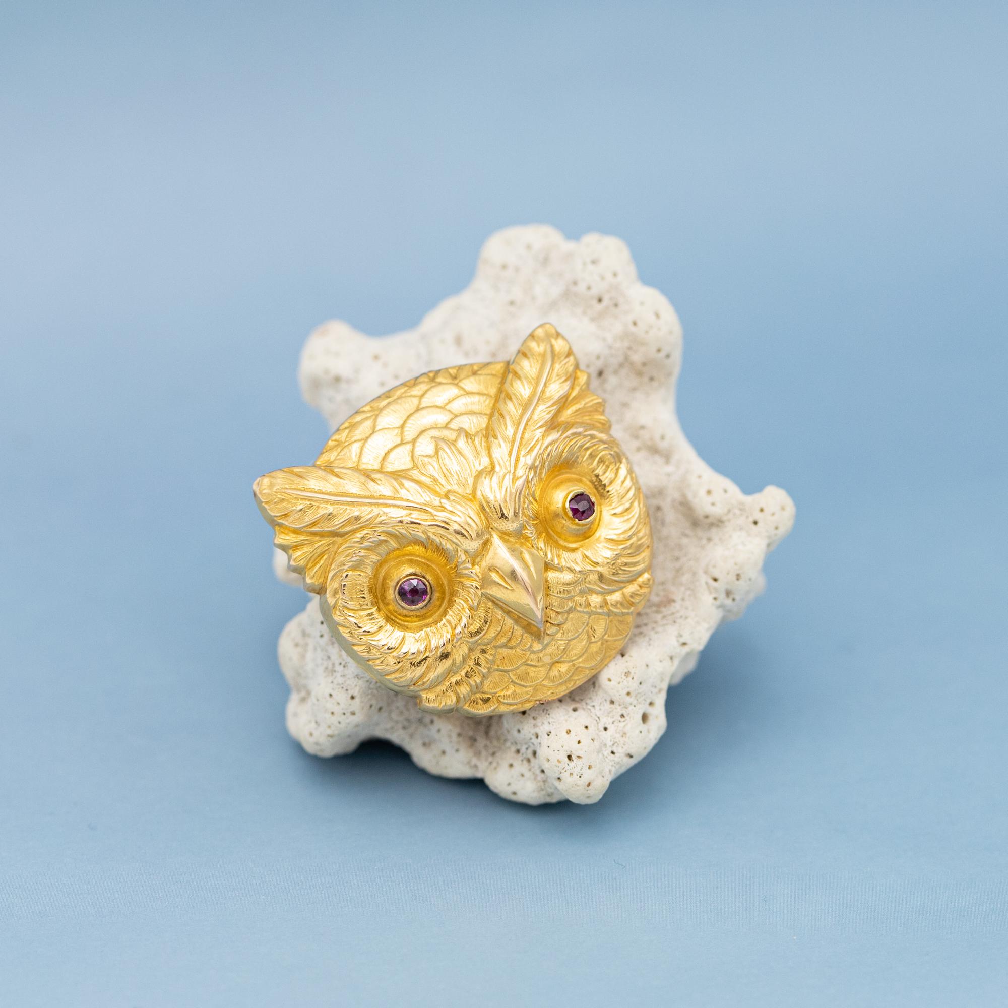 This wonderful Victorian owl brooch stole our hearts the second we laid eyes on it. This antique brooch features a wonderful owl head with many details making the feathers almost appear to be real. Two antique cut rubies are set in the eyes of the