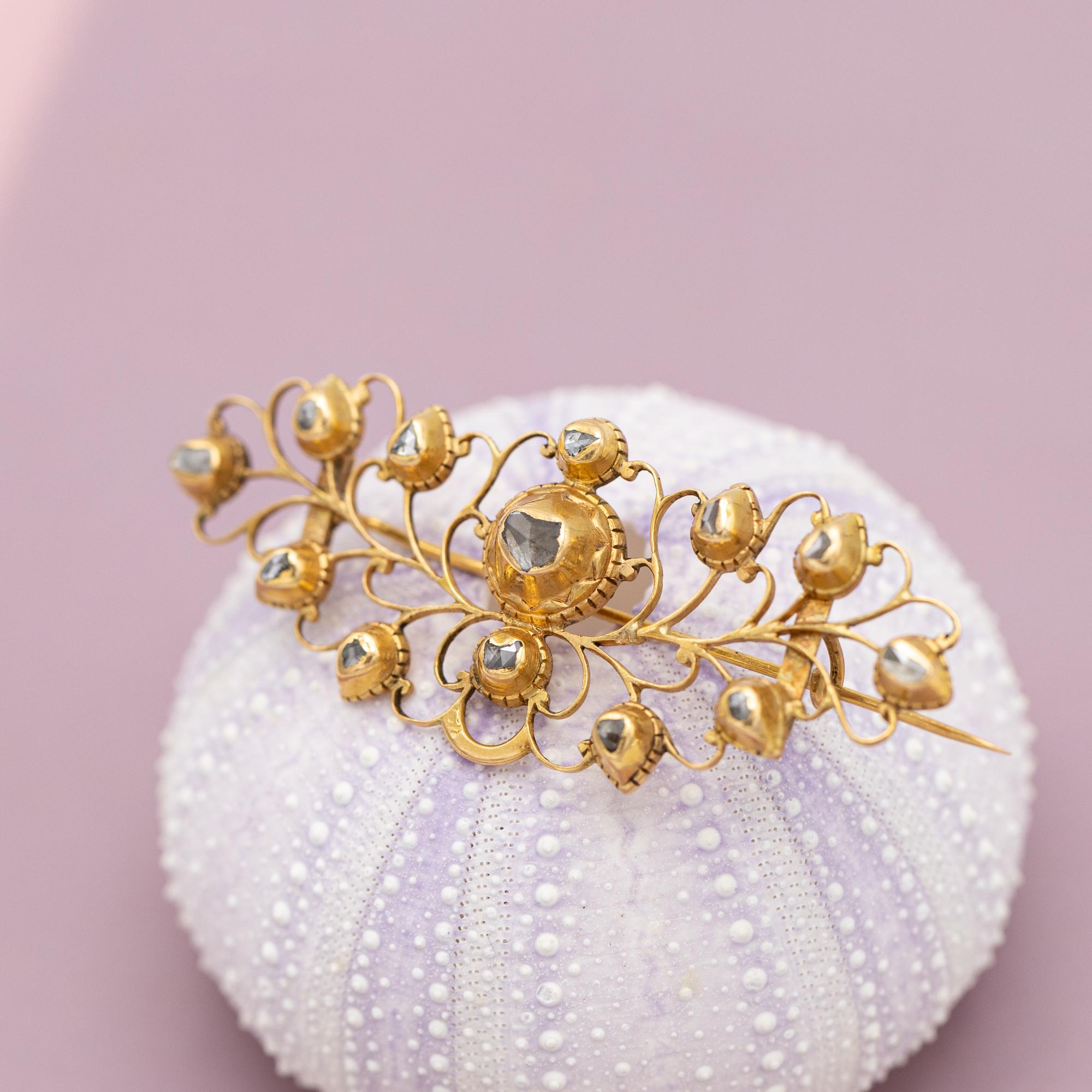 For sale is this stunning Georgian brooch. This beautiful royal brooch was most likely made in Belgium or France in the beginning of the 19th century or late 18th. It is set with exceptionally large rose cut diamonds. These stunning diamonds are in