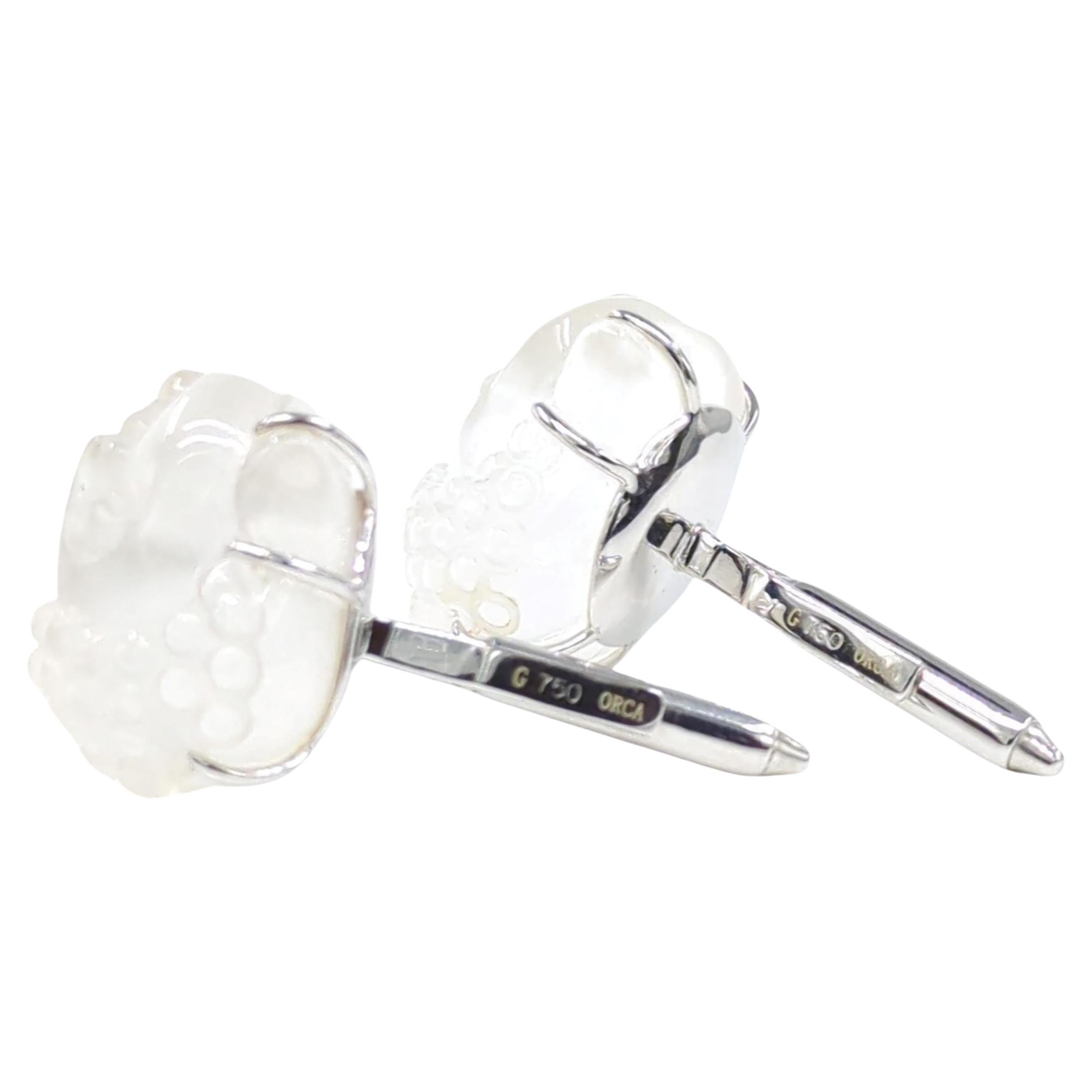 This pair of cufflinks is a remarkable fusion of spirituality and luxury, featuring very rare carved rock crystal Buddha heads. Each cufflink showcases a serene Buddha face, eyes gently closed in a meditative state, exuding a sense of peace and