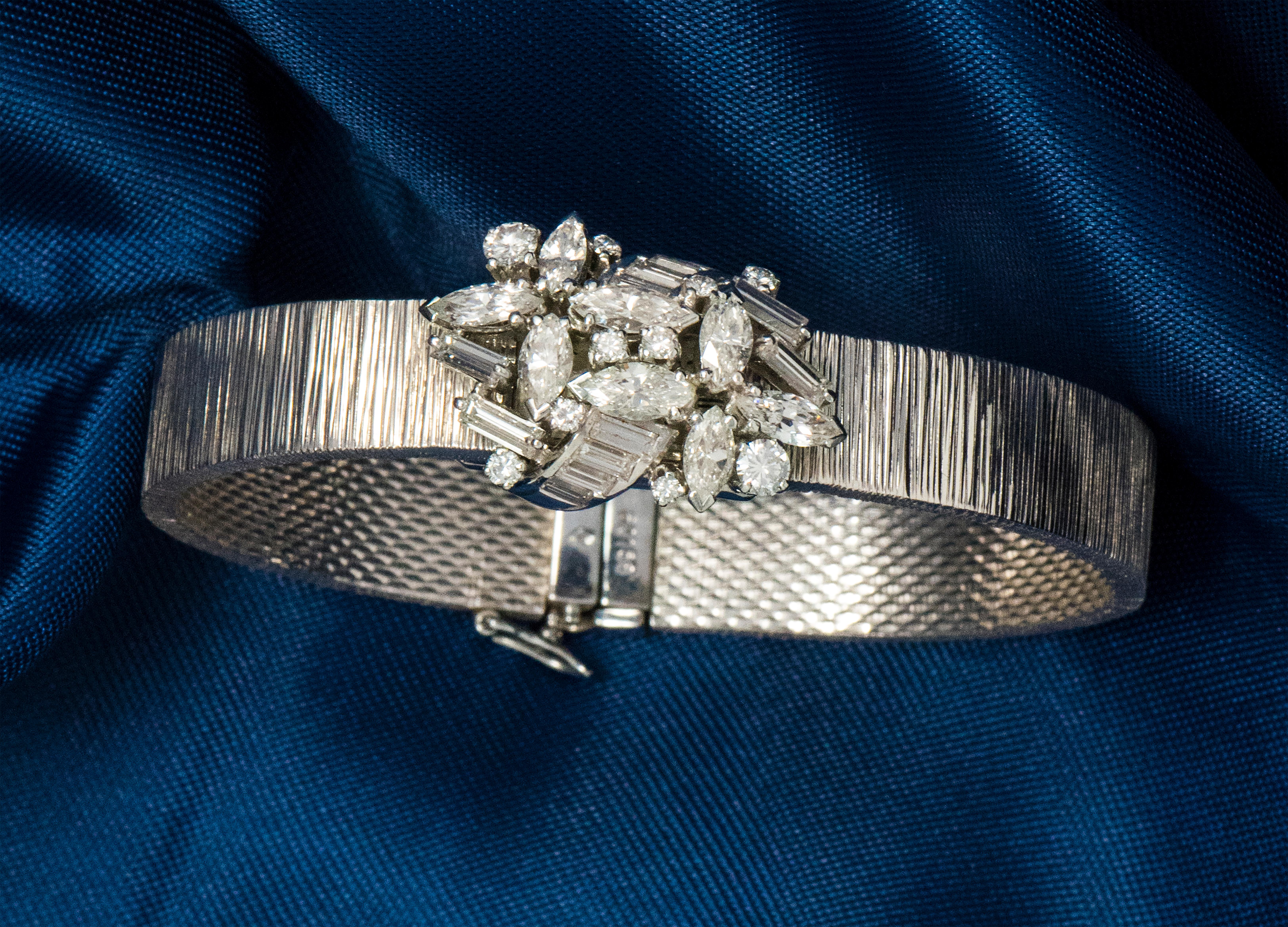 Retro 18 Karat 1950s Omega Double Marquis Diamond Set Flower Concealed Bracelet Watch