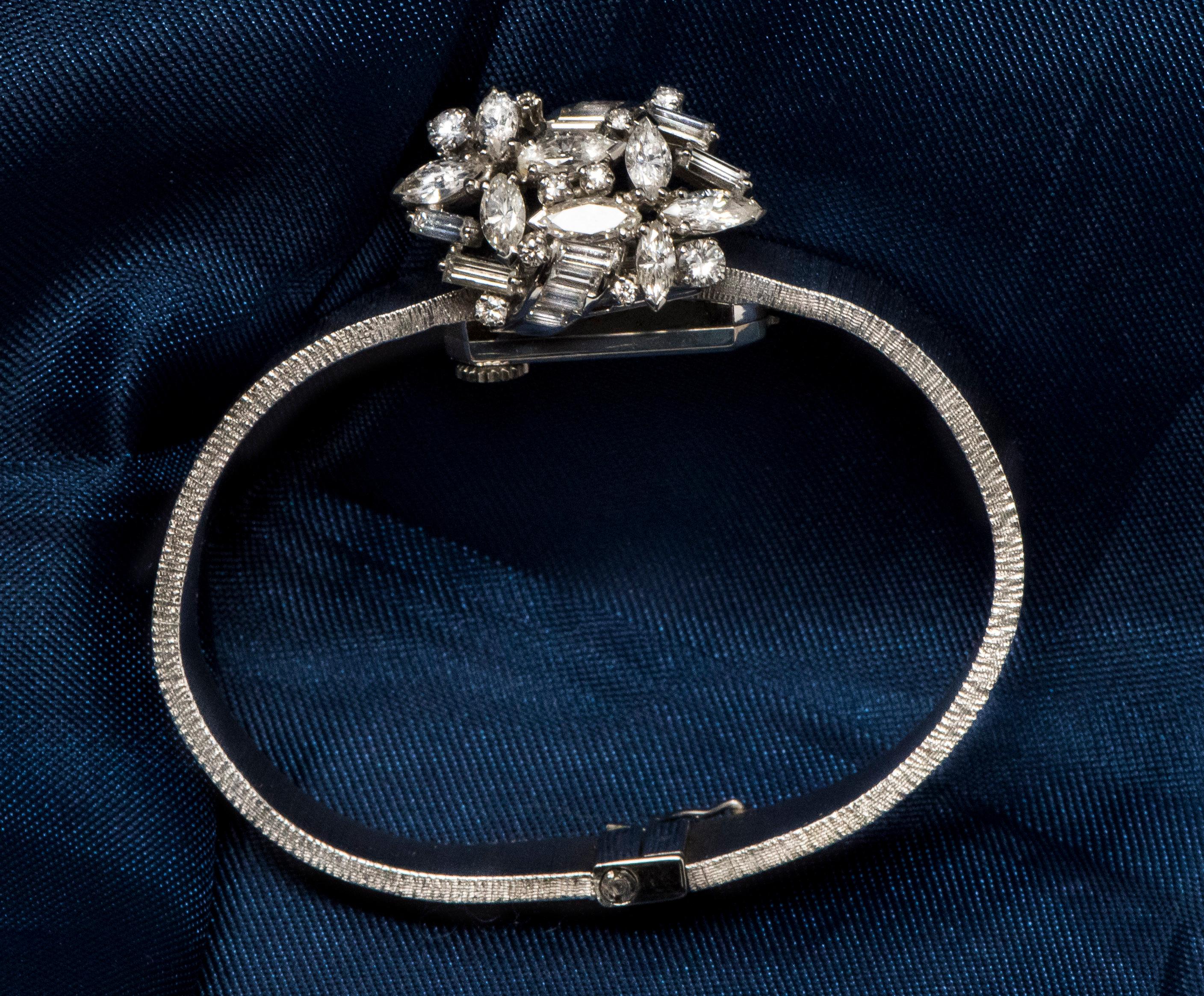 Marquise Cut 18 Karat 1950s Omega Double Marquis Diamond Set Flower Concealed Bracelet Watch