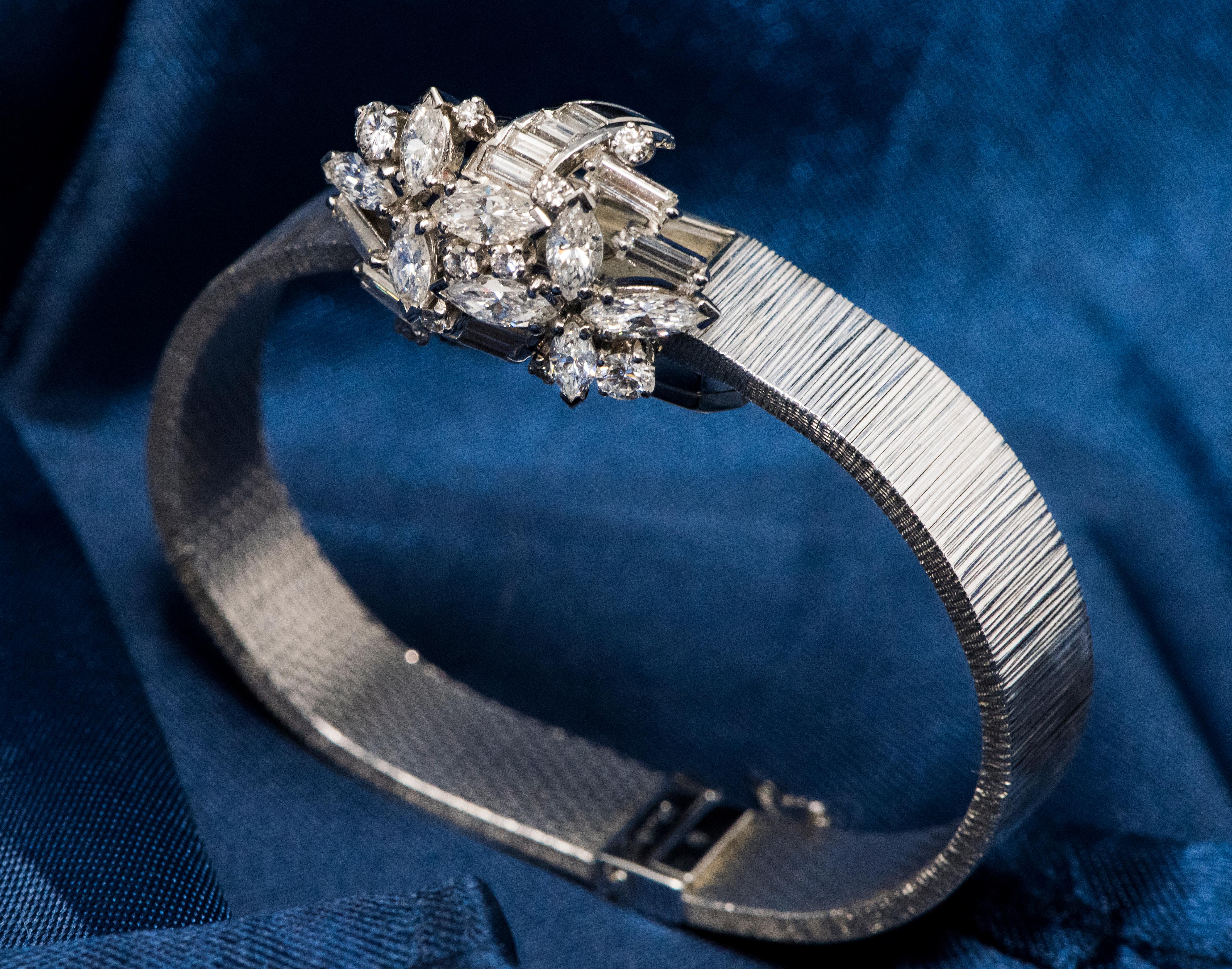 18 Karat 1950s Omega Double Marquis Diamond Set Flower Concealed Bracelet Watch In Excellent Condition In New york, NY