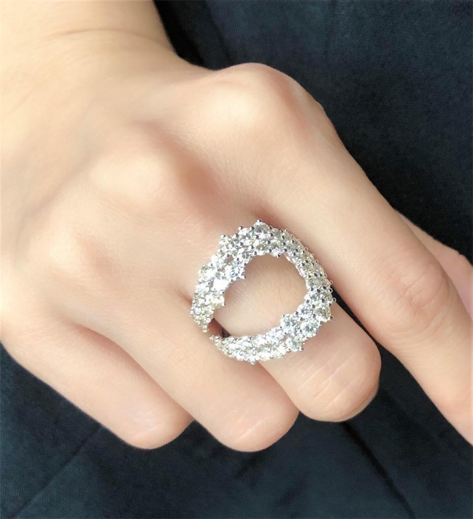 The Following Item we are offering is a Rare Important Radiant 18KT Gold Large Rare Fancy Gorgeous Diamond Buckle Wrap Style Statement Ring. Ring is comprised of a Gorgeous Array of Glittering Fancy Diamonds!!! T.C.W. approx 2CTS!!! This Gorgeous
