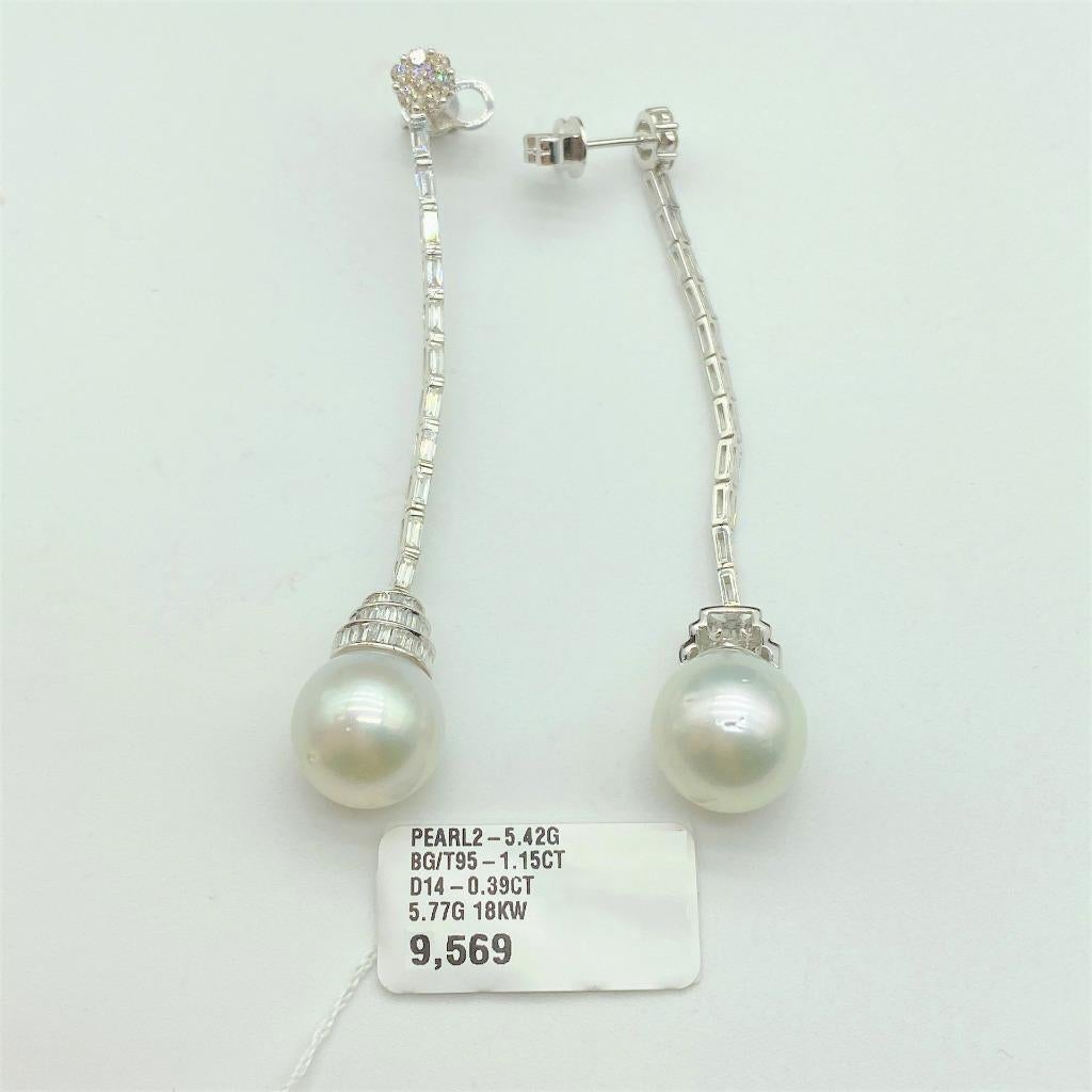 The Following Item we are offering are these Extremely Rare Beautiful 18KT Gold Fine Large Fancy Pearl Earrings comprised with over 1.50CT Carats of Fine Gorgeous Tapered Baguette Glittering Diamonds and Round Diamonds at top!! These Rare