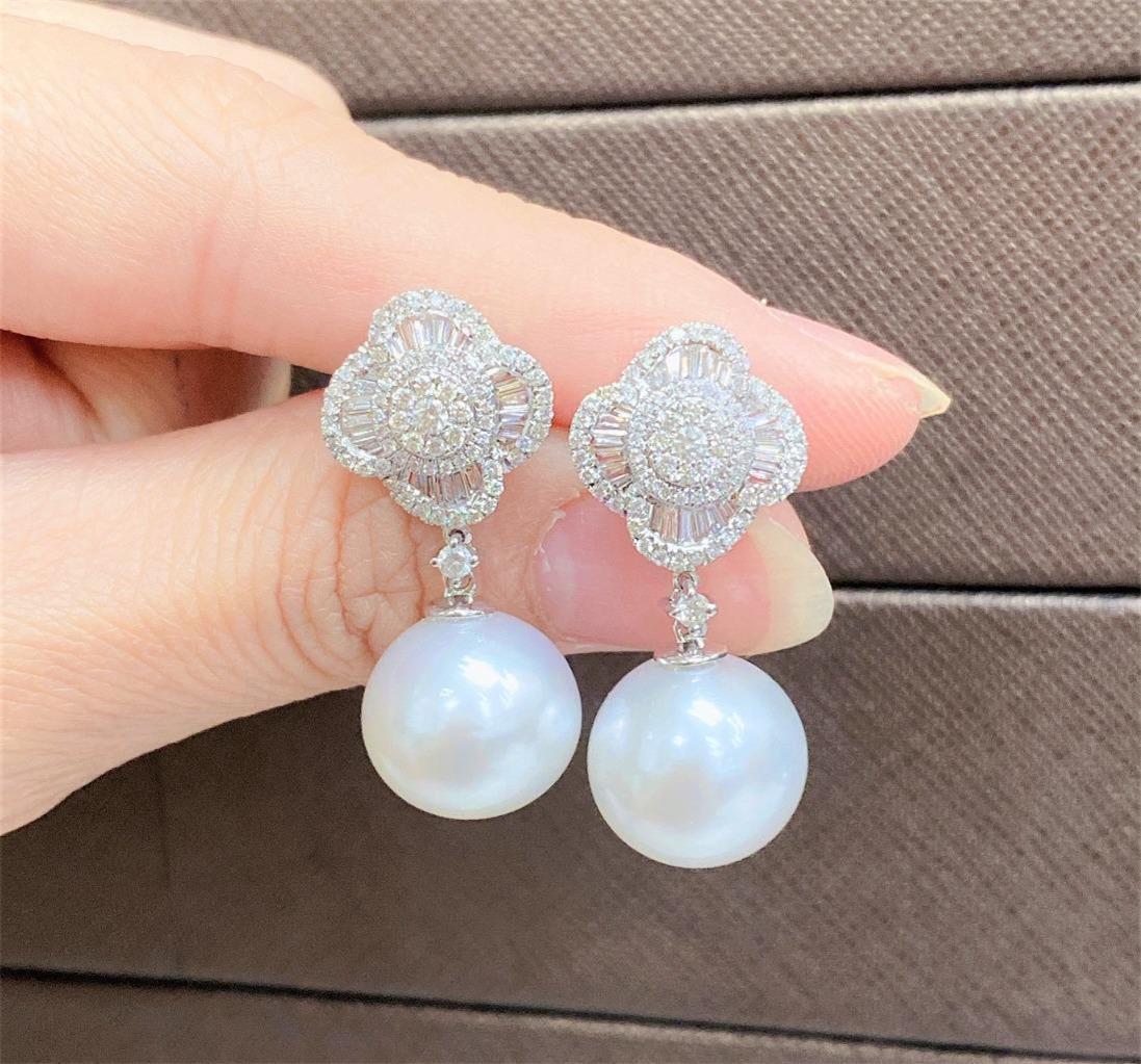 The Following Item we are offering are these Extremely Rare Beautiful 18KT Gold Fine Large Fancy Pearl Earrings comprised of approx Exquisite AA-AAA Quality Pearls with approx 1CT Carats of Fine Gorgeous Glittering Diamonds in the form of Alhambra