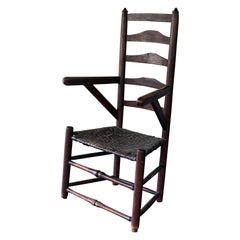 Rare 18th C Early American ladder back chair with arms. Dated 1745
