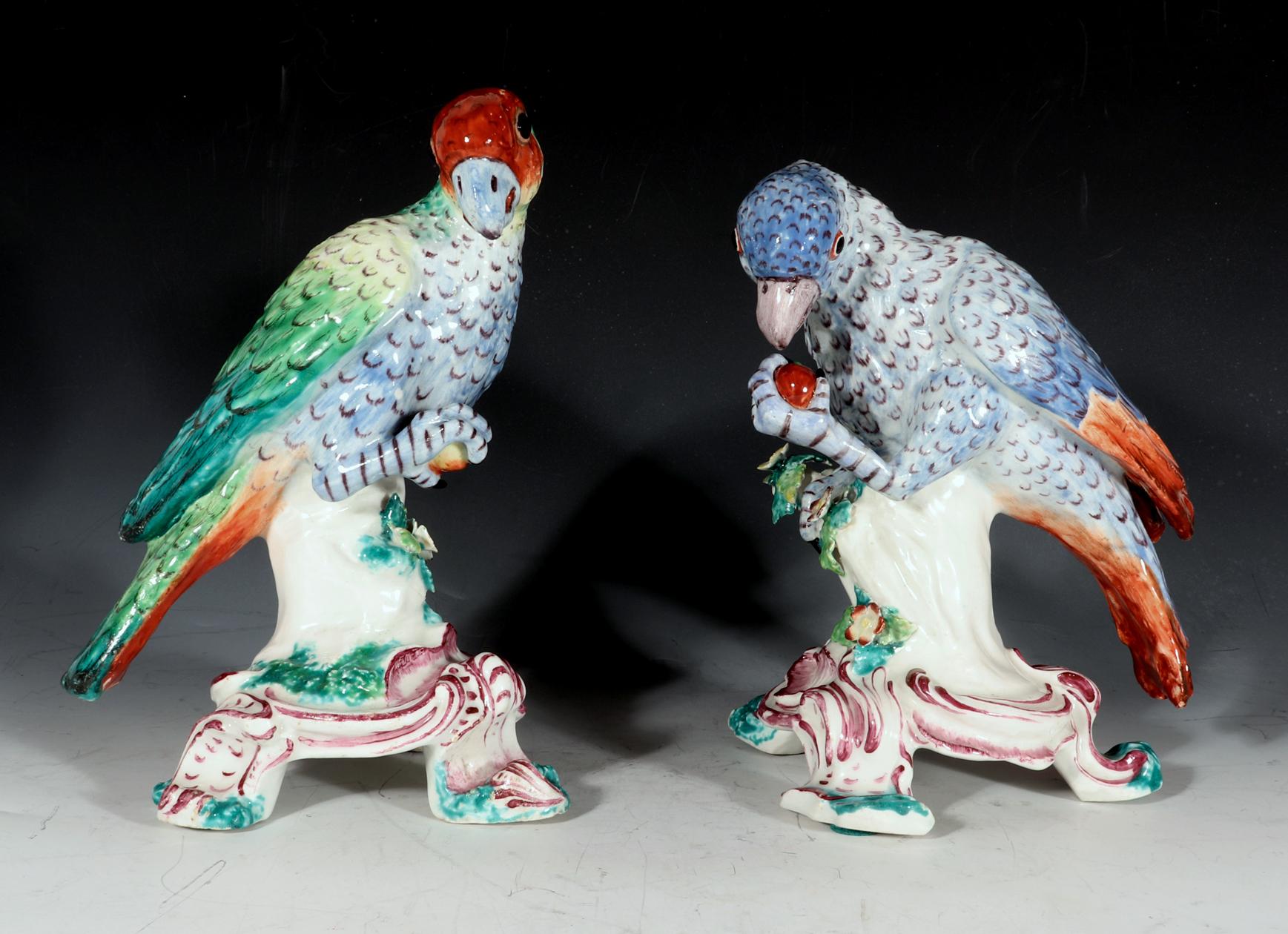 18th-century bow porcelain Models of South American Parrots,
Circa 1758-62

These beautiful Bow porcelain birds are naturalistically modelled, each perching on a flowering stump issuing from a rococo-scroll moulded base. They are both standing on
