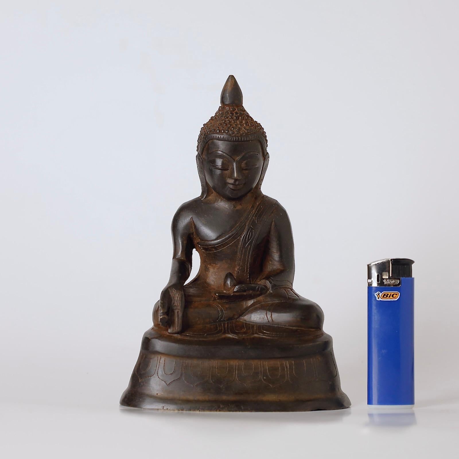 Rare 18th-Century Bronze Buddha Statue – Shan Kingdom, Burma

A rare and finely cast bronze statue of the Buddha, depicted in the Mara Vijaya (Calling the Earth to Witness) posture — a powerful gesture symbolizing the Buddha’s triumph over illusion