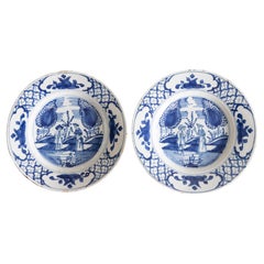 Rare 18th century Chinoiserie Delft Plates with Figures, a Pair