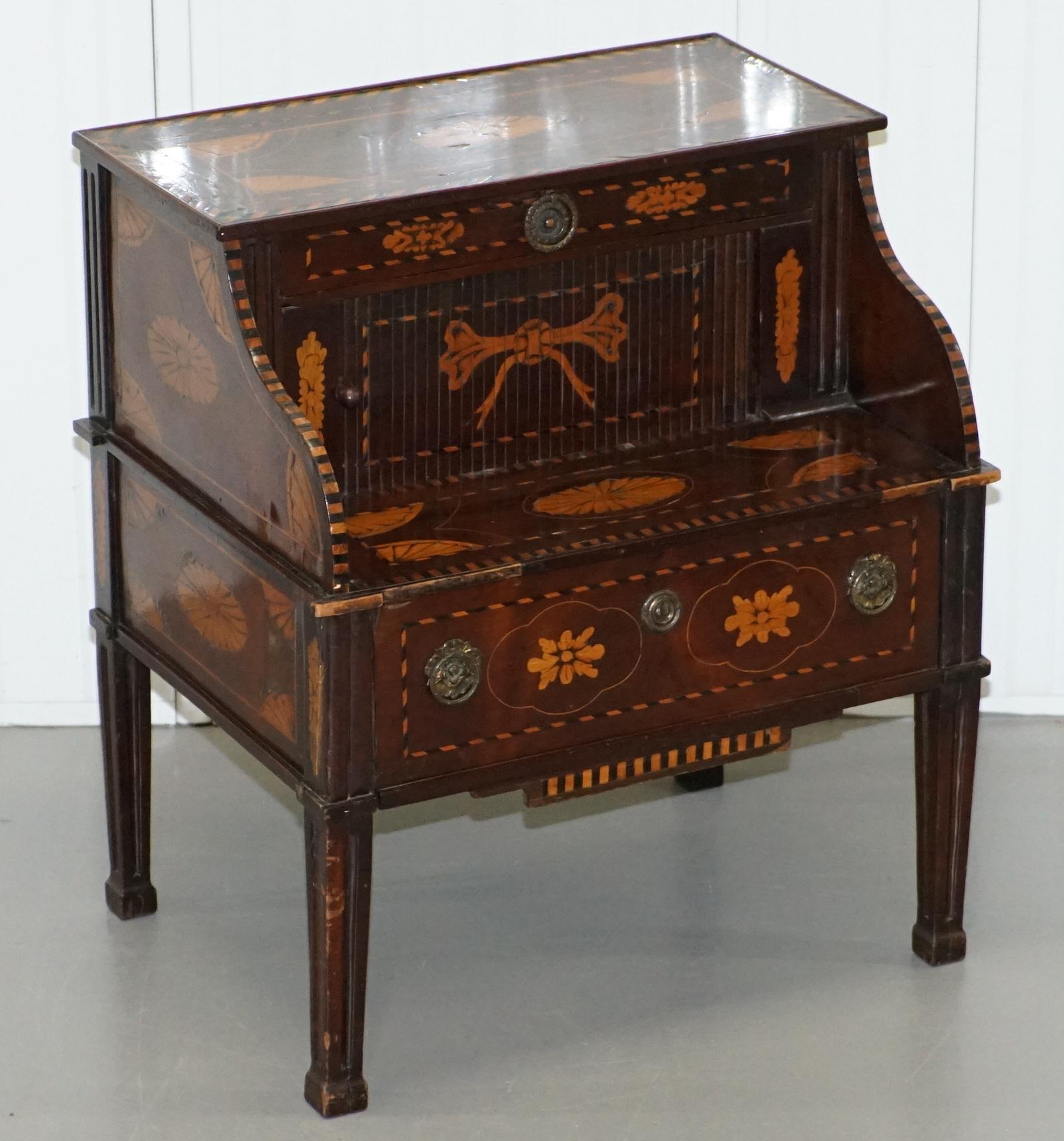 We are delighted to offer for sale this very rare tambour fronted 18th century Dutch marquetry inlaid side table

A very good looking and well made piece, hard to believe its nearly 240 years old! The timber patina is glorious, it looks sublime