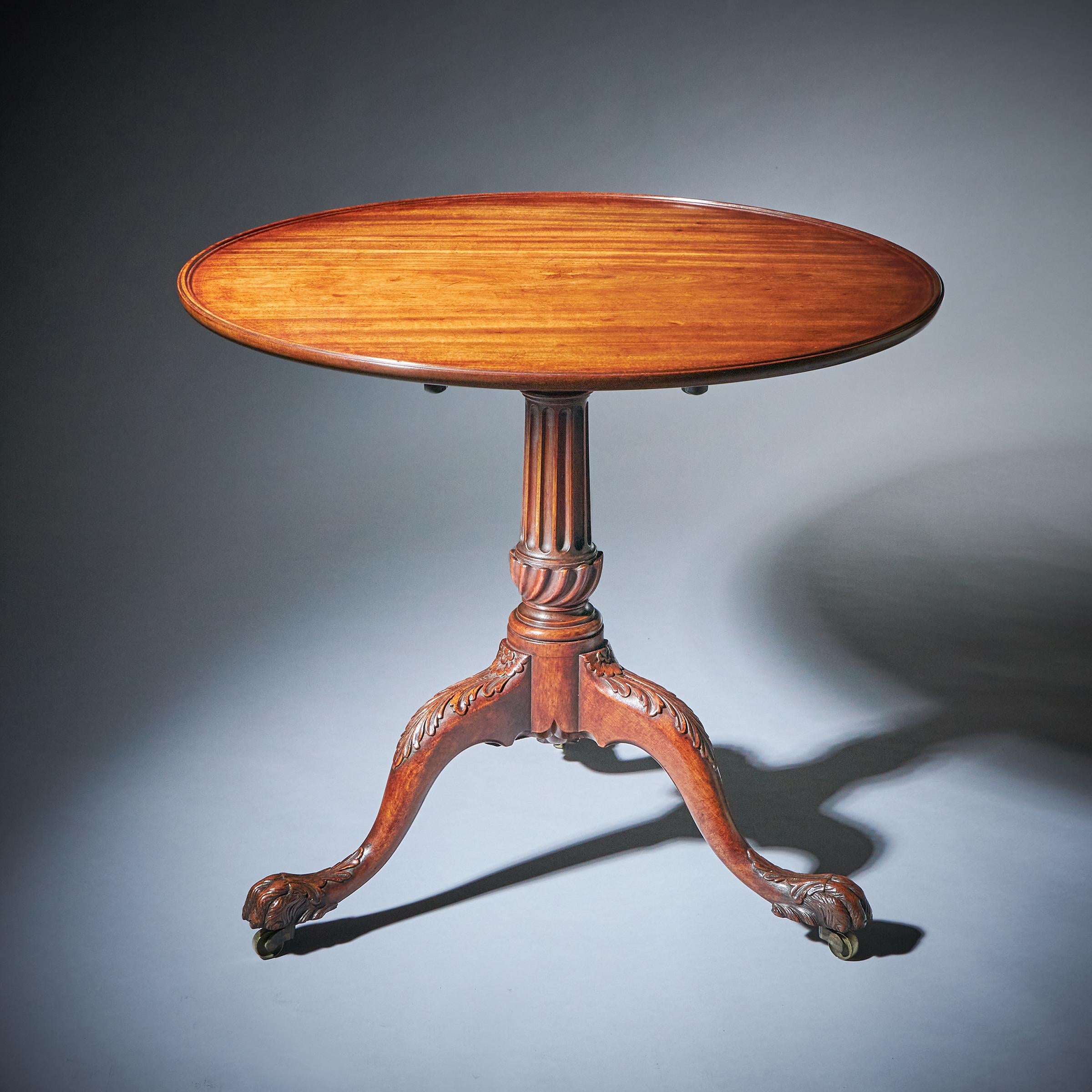 A fine and possibly unique mid-18th-century George III mahogany tray-top tripod table, Circa 1760-1770. Ireland 

The solid one-piece moulded tray top is set with a fine parquetry star inlay over the solid stop-fluted column, leading to a finely
