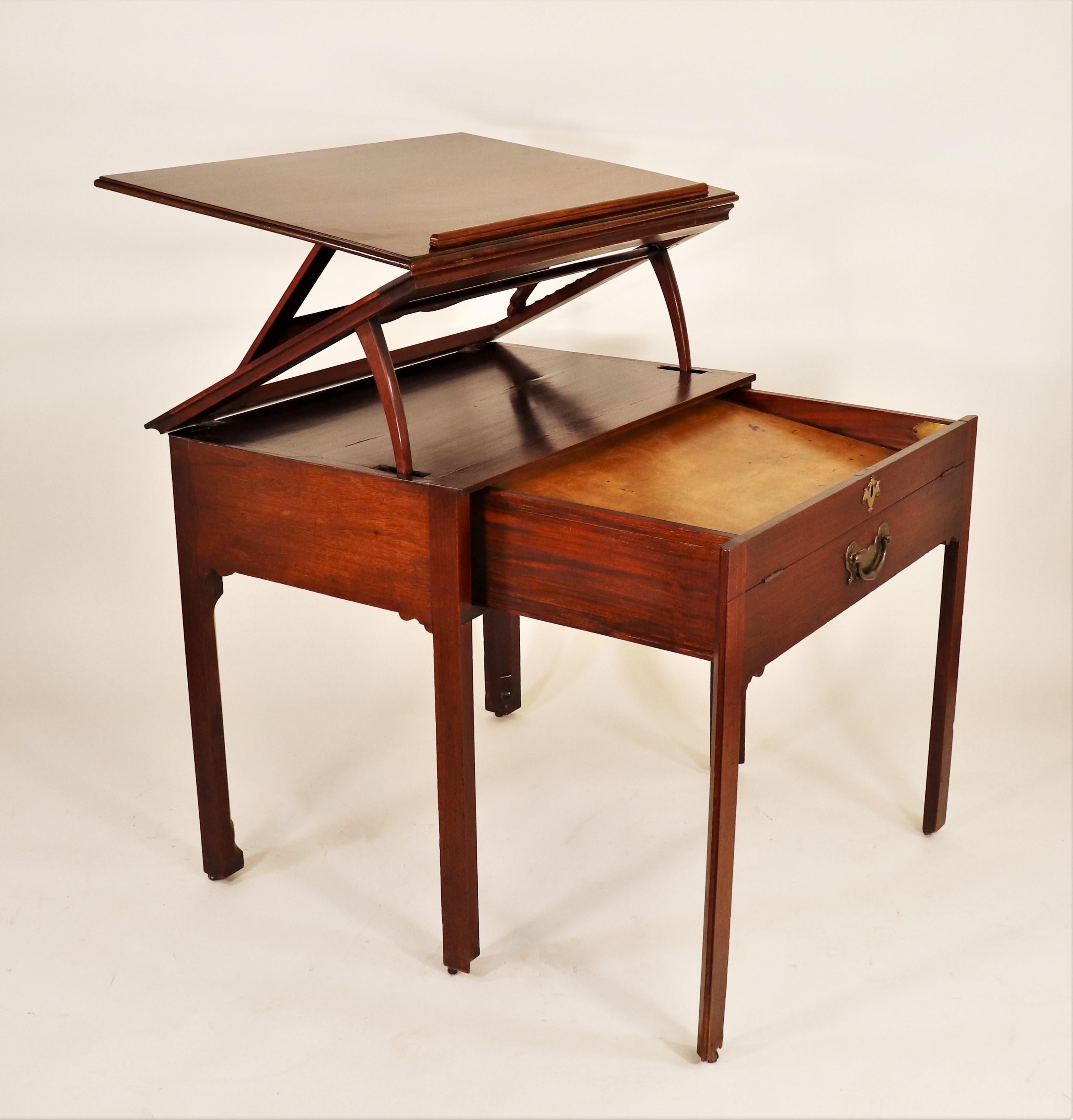 This rare and elegant Georgian Architect’s desk has a ratchet top, extending drawer front, as well as storage compartments. Architect desks, more commonly known now as drafting desks, were built for artists, architects, and engineers, serving as