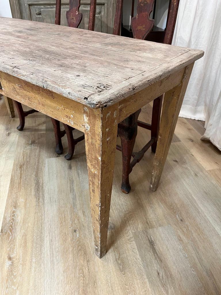 Rare 18th Century Italian Tuscan rustic table, original paint and finish of a terra cotta hue. Works well as a console table, desk, or sofa table.  27.25” h. x 54” w. x 21.5” d.

