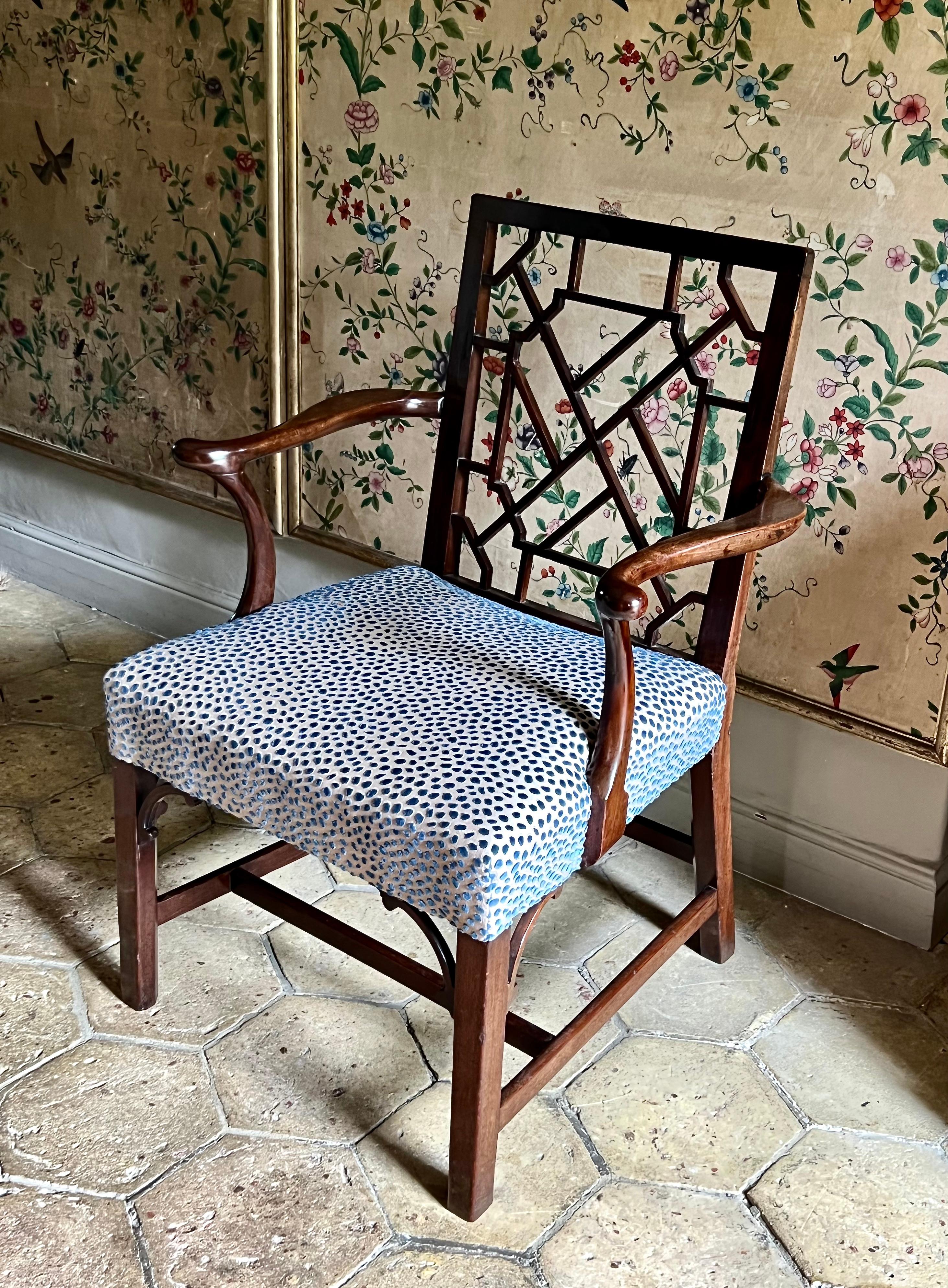 A rare 18th-century mahogany Cockpen armchair. George III period, ca 1762.

A stylish antique Cockpen armchair in mahogany. With chinoiserie open-fretwork frame and angle brackets.

Some very minor historic restorations entirely commensurate with