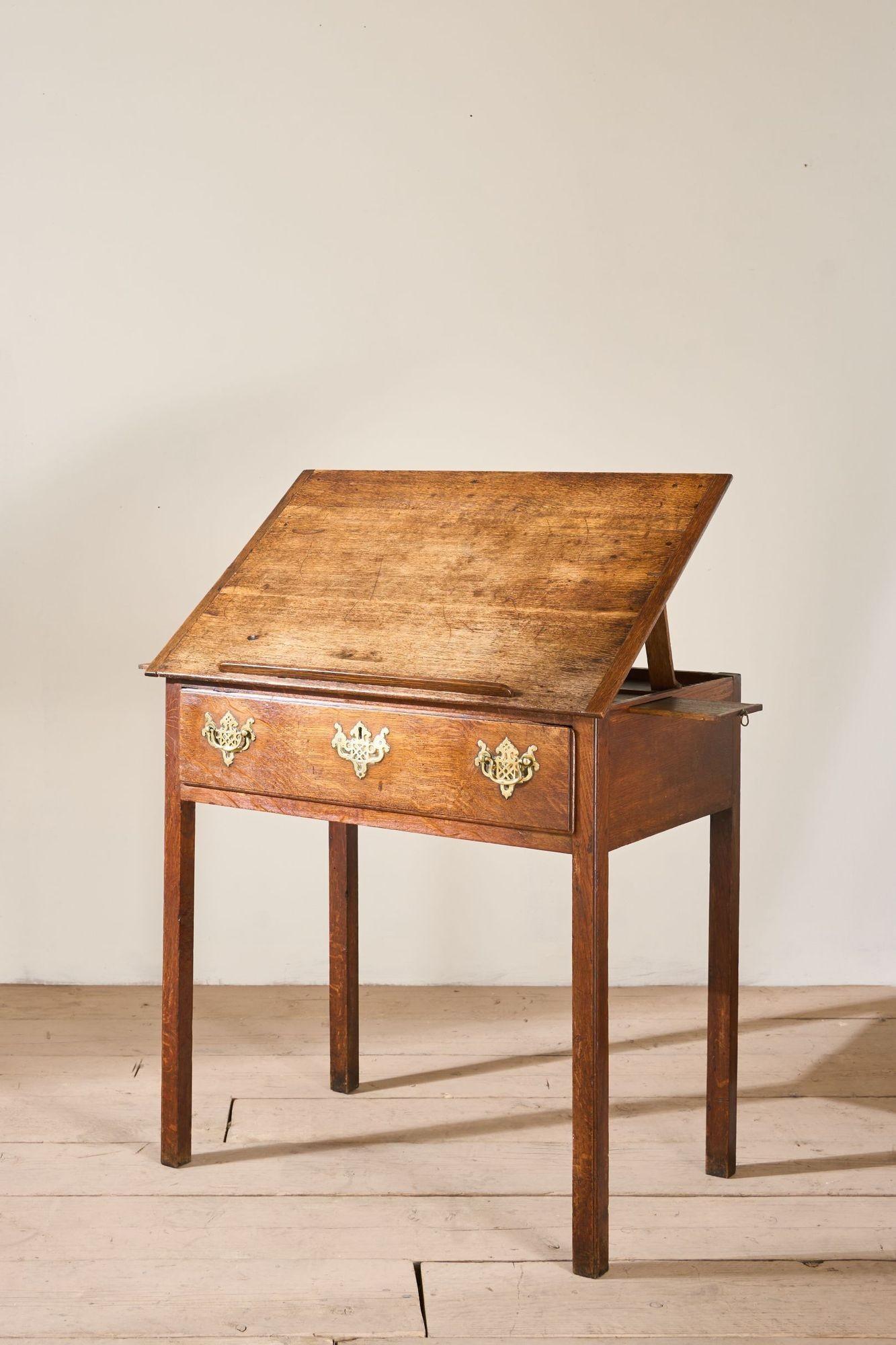 This is rare and unusual 18th century oak artists table. Really smart design and totally original condition. When not in use this looks like a nice quality 18th century Low boy making it very decorative. But for those that know this turns into a