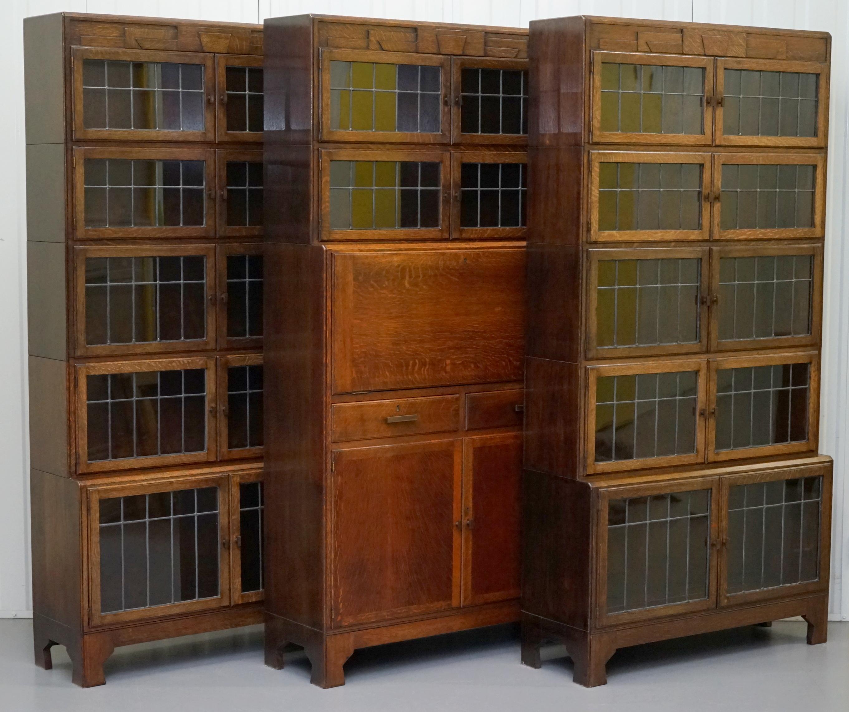 We are delighted to this very rare circa 1900 suite of three Minty Oxford golden oak stacking modular library legal bookcases

This is an exceptionally rare find, firstly if you are not familiar with stacking bookcases each section can be removed