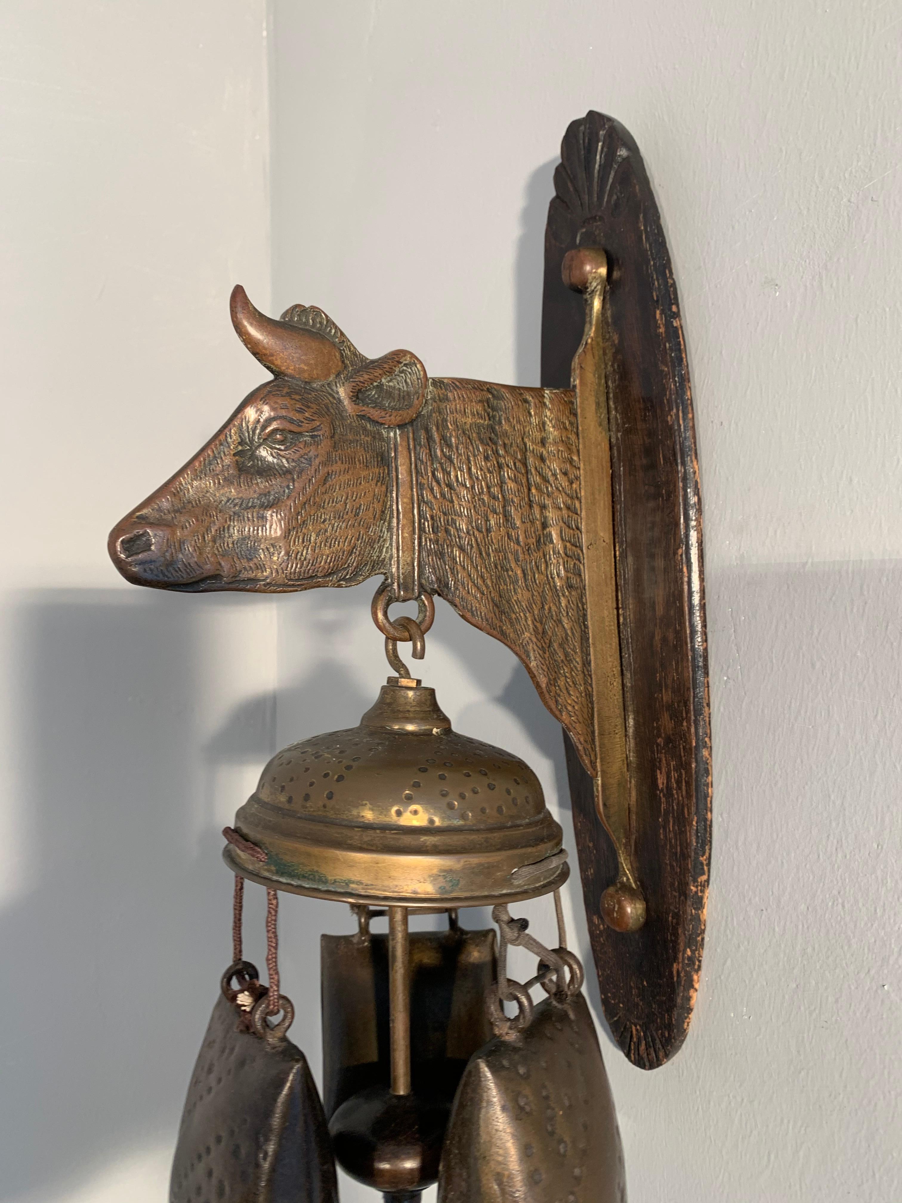 Very rare and striking (pun intended) Arts & Crafts gong / bell.

This totally original house gong with a cow sculpture even comes with the original and perfect condition striker. The beautifully patinated cow is are a real joy to look at and the