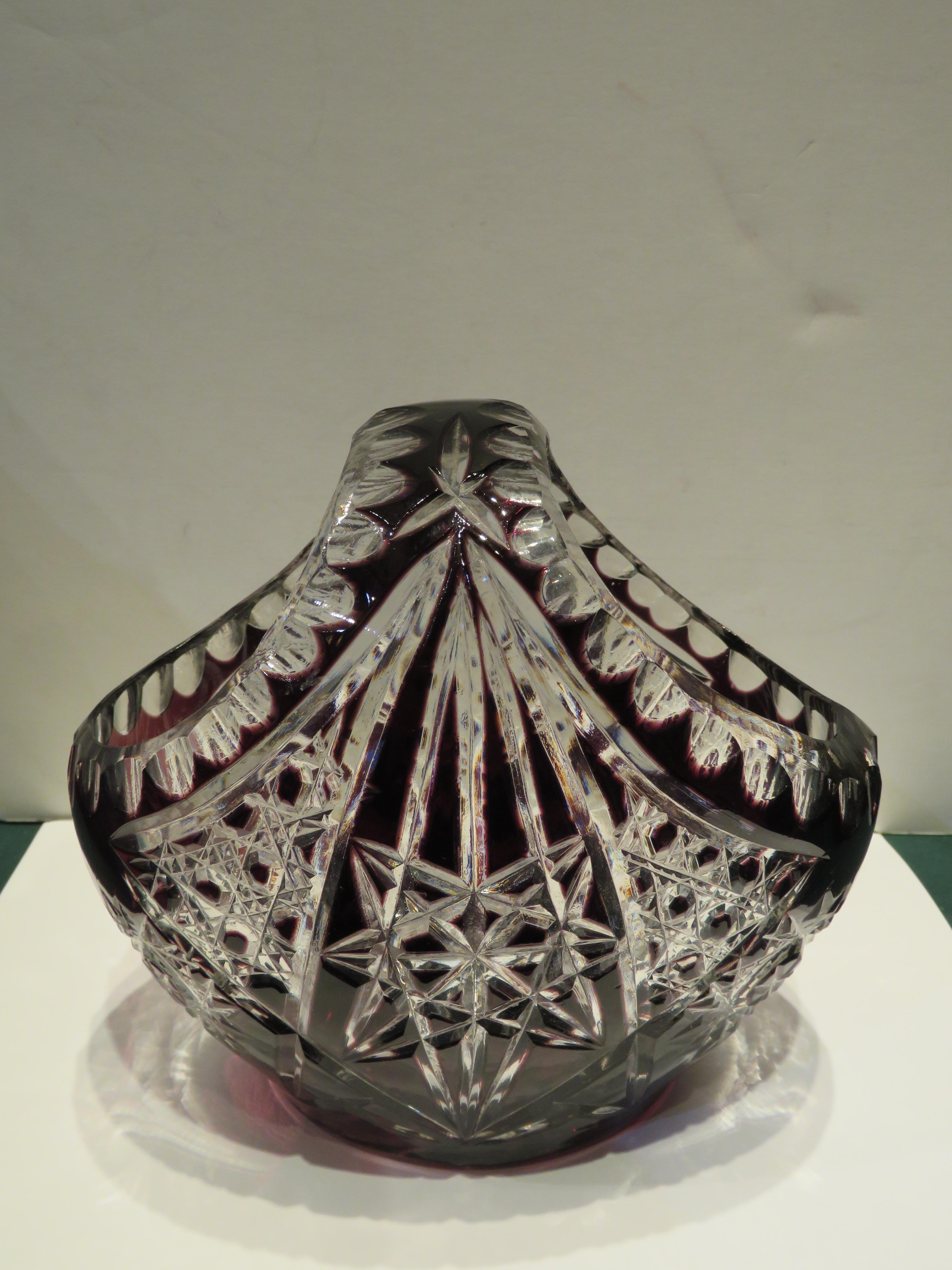 The Following Item we are offering is a Rare Antique Lovely HEAVY HANDCUT Amethyst Hand Cut Crystal Glass Basket. Basket is Finely Detailed Throughout in a Magnificent Pattern Surrounded Throughout.  
Approx: 7