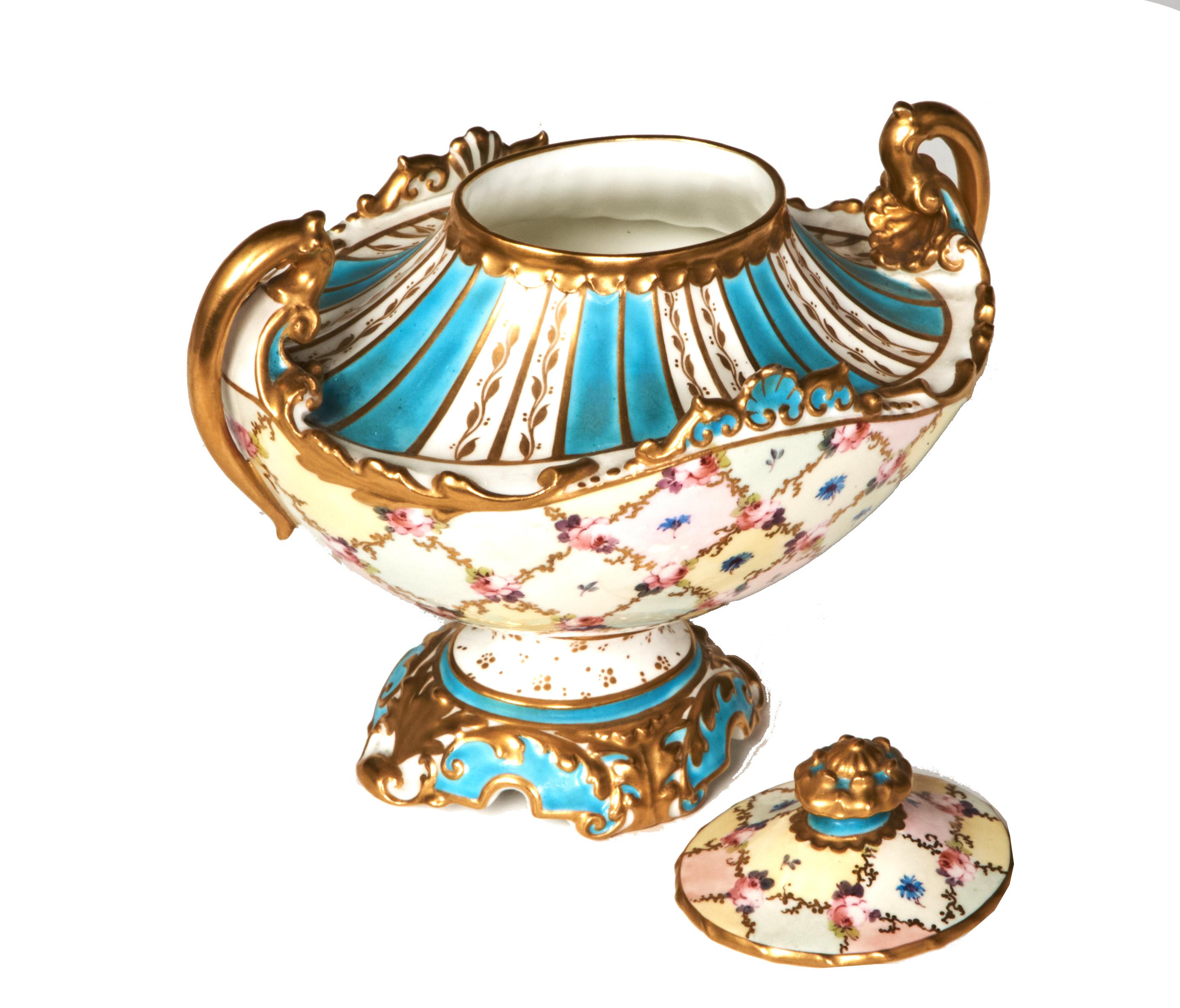Delicately hand painted small antique covered dish by Royal Crown Derby with stripes of Sevres blue and white and a lattice pattern in gold and tiny flowers. No signs of wear to the gold or use. It is in excellent condition without cracks, chips or