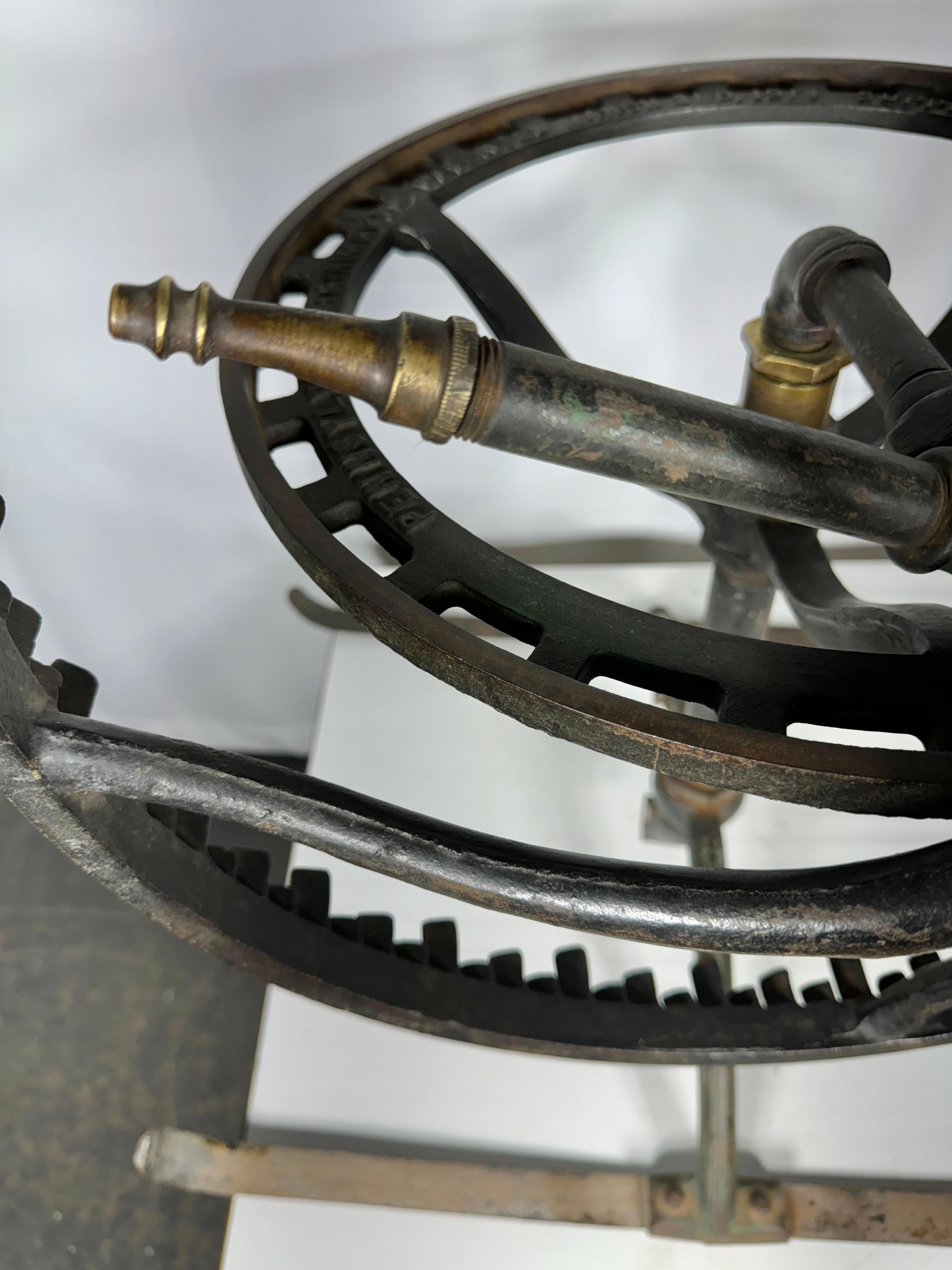 Rare 1914 Industrial cast Iron Lawn Sprinkler/Sculpture  Pennsylvania Rainmaker In Good Condition In Buffalo, NY
