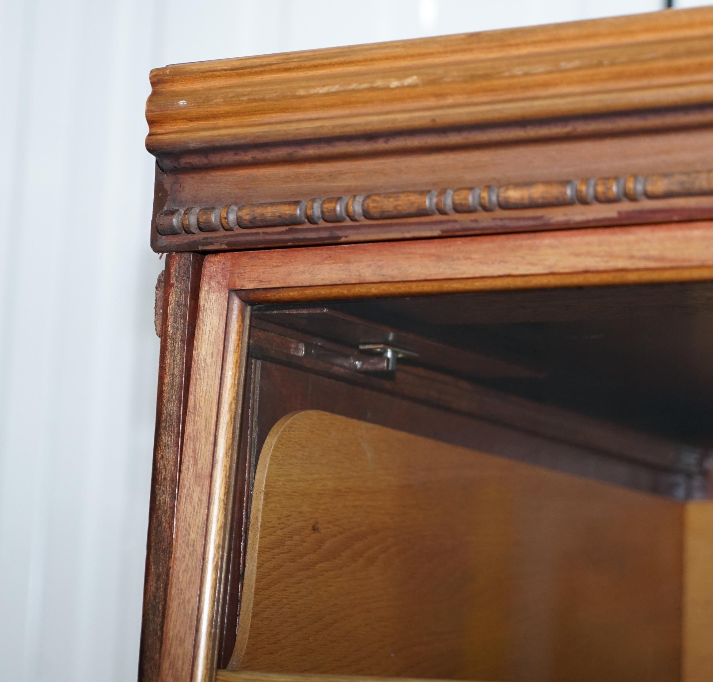 Early 20th Century Rare 1920s Haberdashery Stacking Cabinet 10 Retracting Doors 28 Sliding Shelves