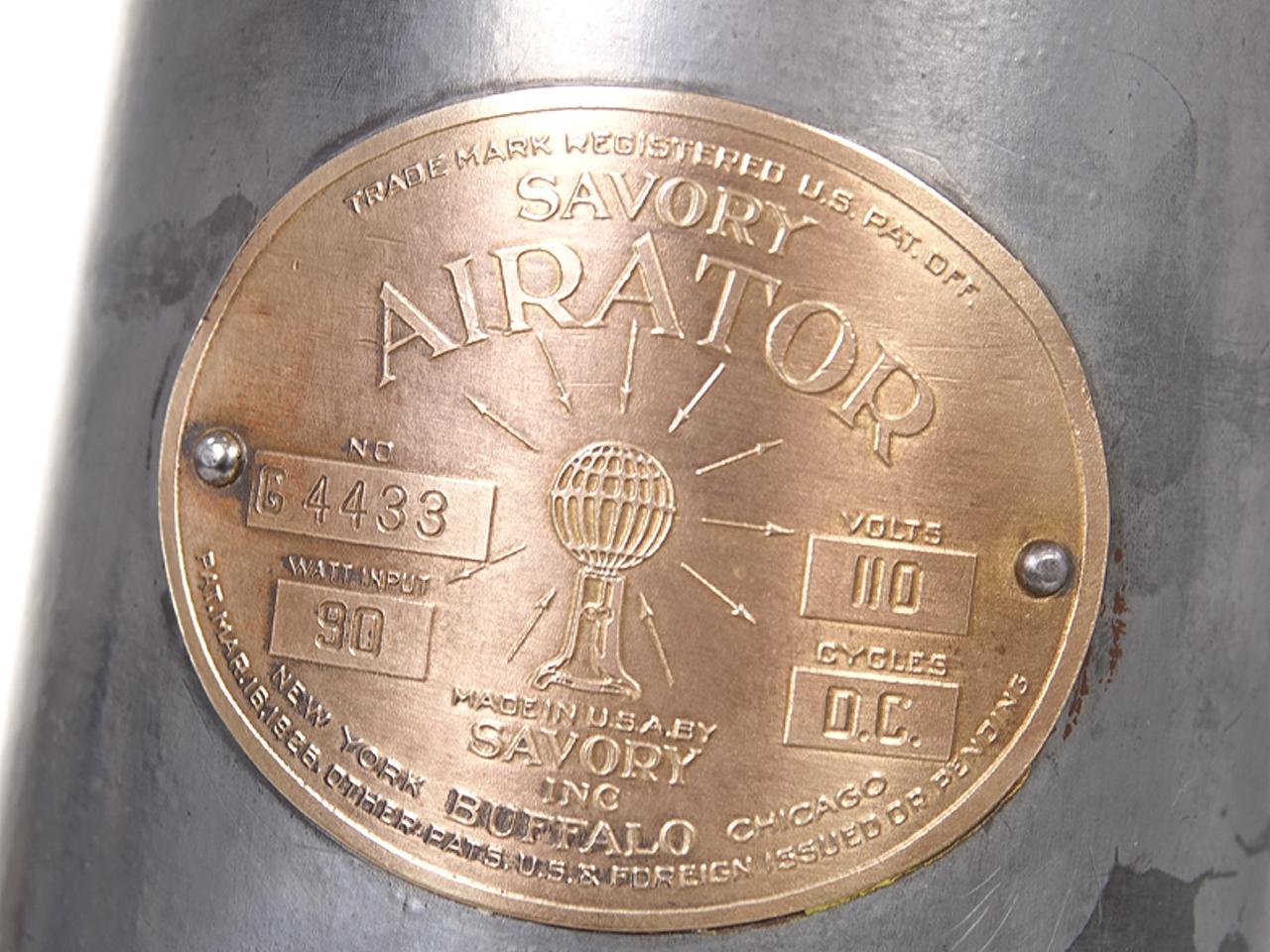This vintage cast iron bankers fan Signed Savory Airator. The company states that the horizontal blades blow the air upwards, so it will not disturb any papers on a desk or table. It was made during the 1920s. and is in perfect working order. The