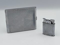 Raro portasigarette Art Deco Evans cromato e smaltato degli anni '30 e set di legacci abbinato