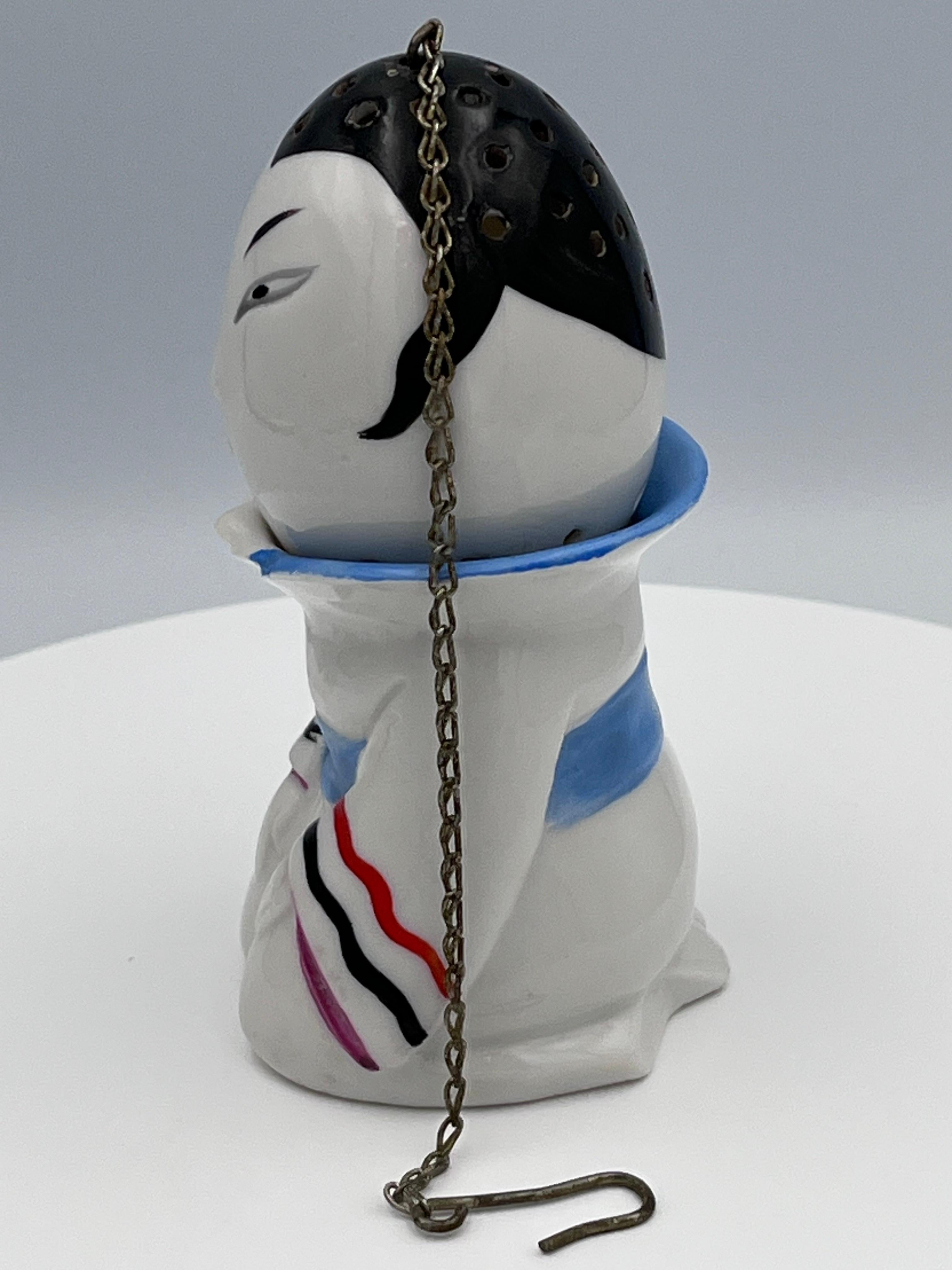 Glazed Rare 1930s Art Deco German Porcelain Orientalist Style Figural Tea Strainer For Sale