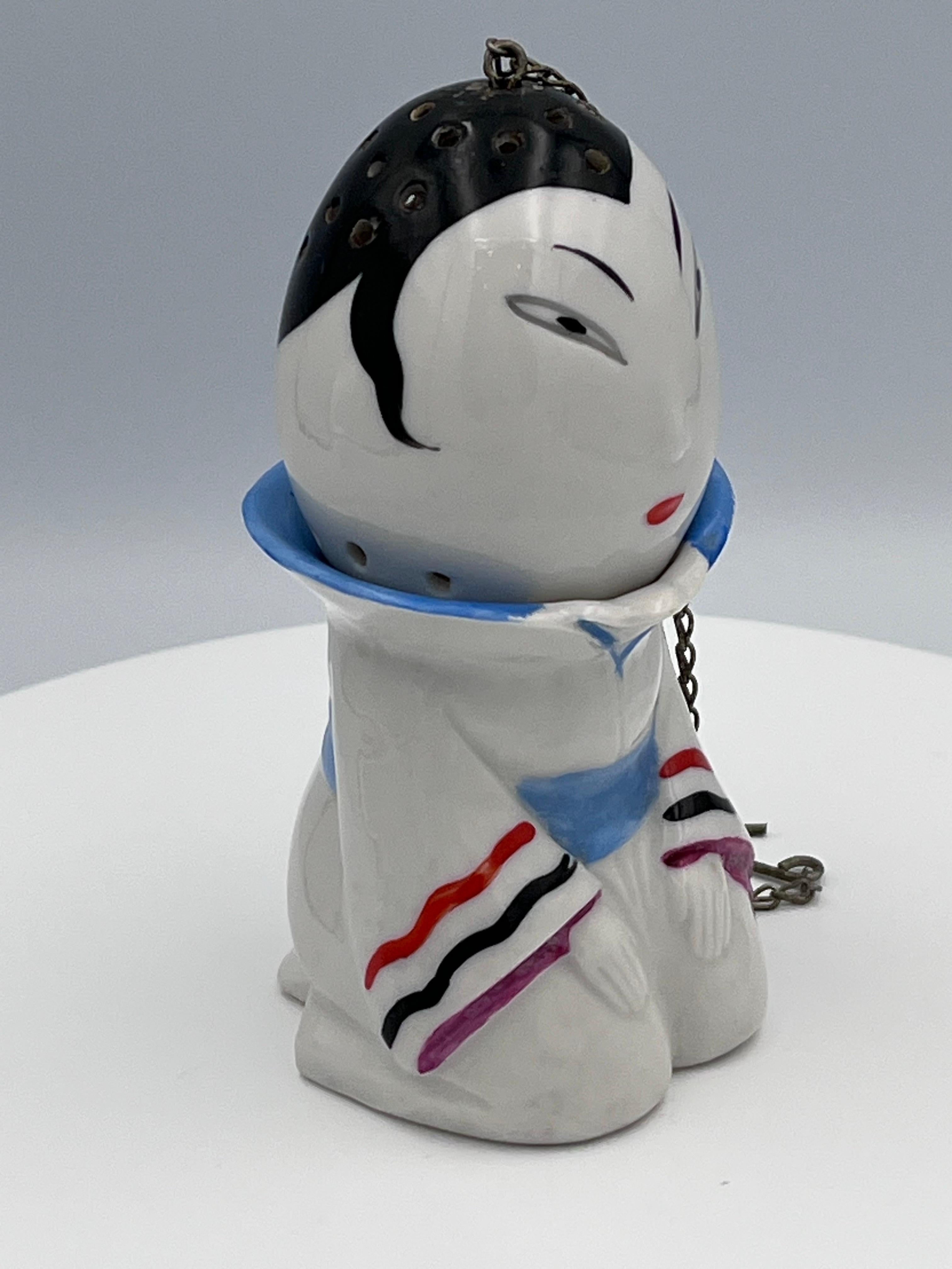 Metal Rare 1930s Art Deco German Porcelain Orientalist Style Figural Tea Strainer For Sale