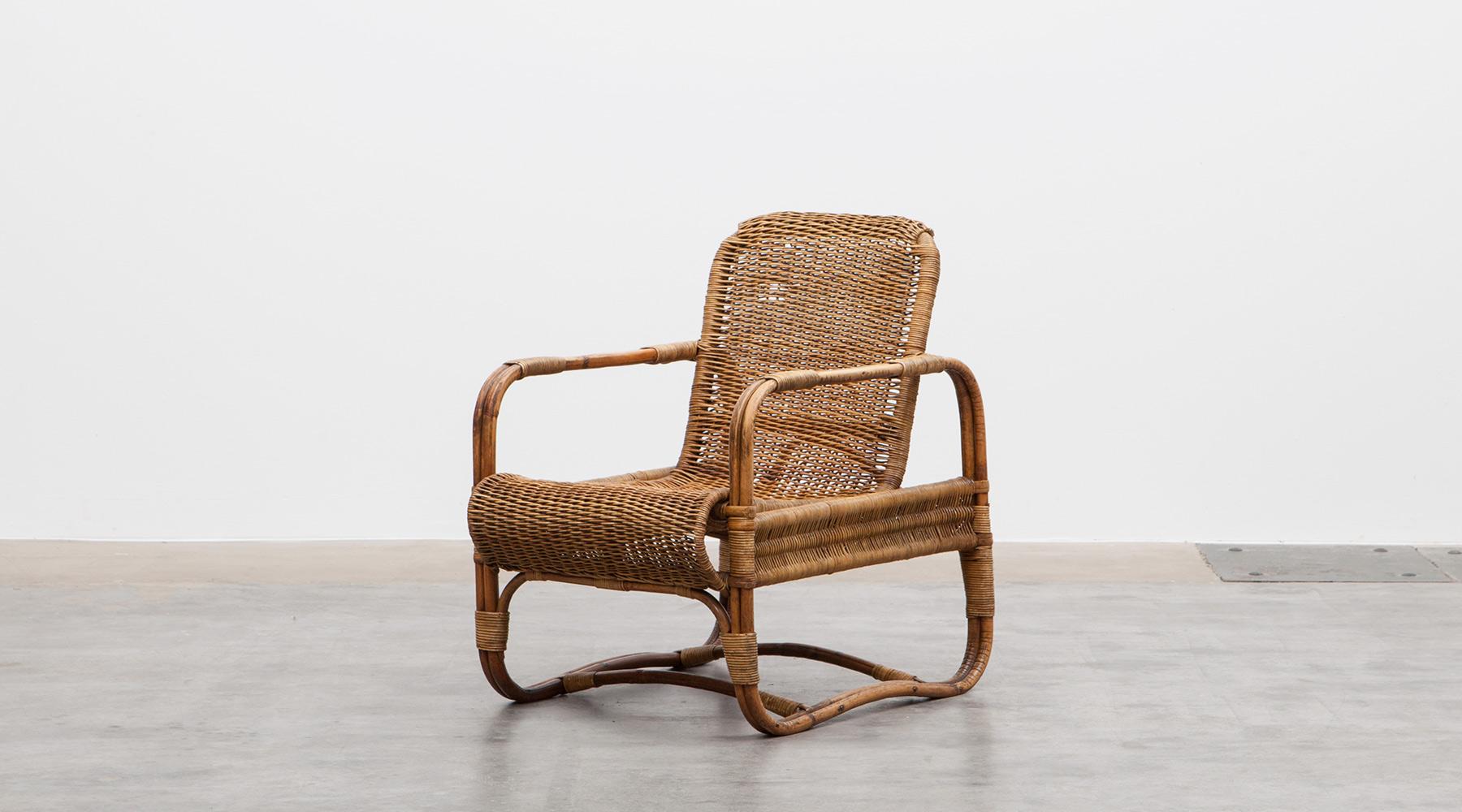 Rattan chair by Erich Dieckmann, Germany, 1931.

The single chair by Erich Dieckmann from 1931 is made out of cane. Although the shape is curvy, the rattan chair keeps the typical clear shape of Dieckmann. Manufactured by F. Kerber, Germany.